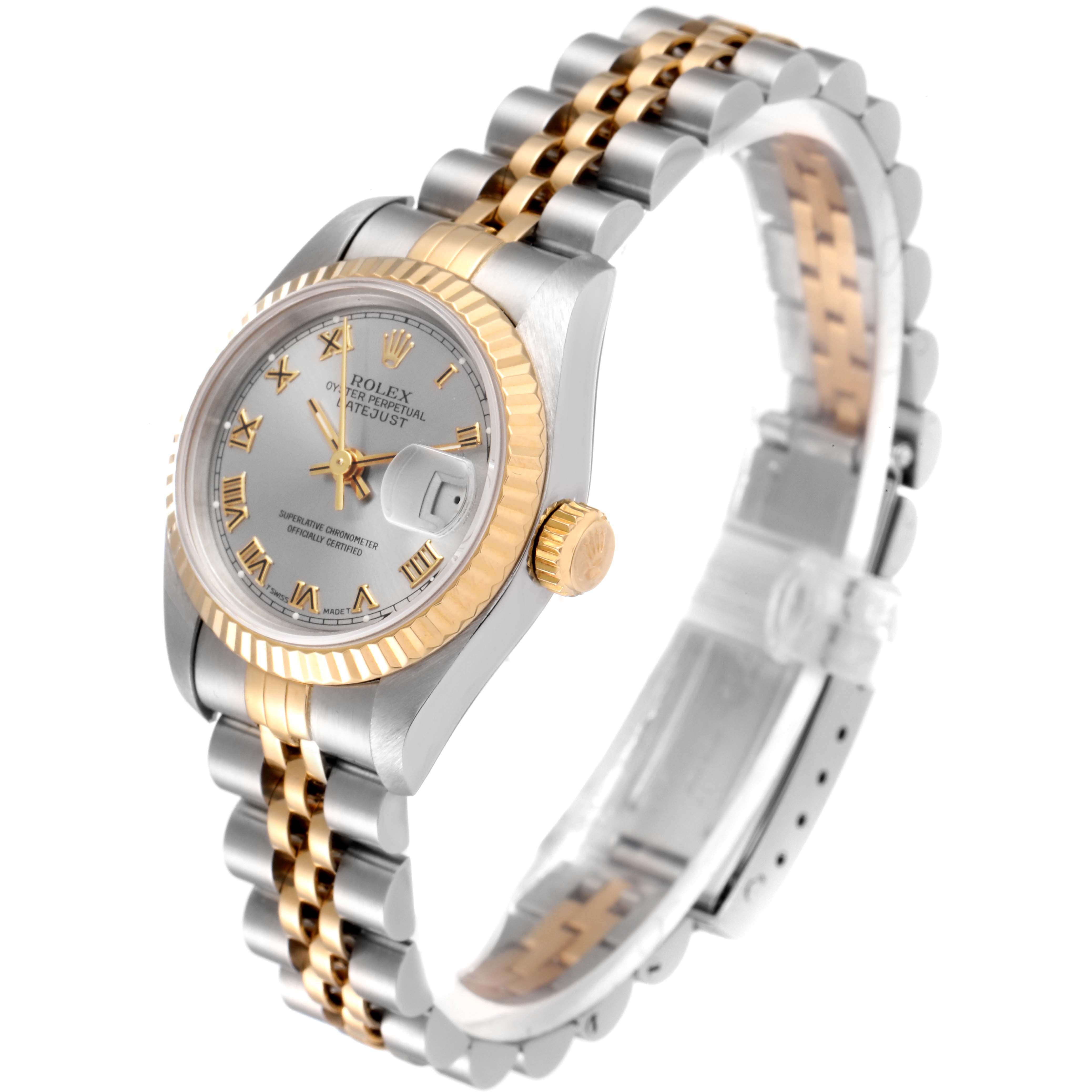 This image shows a Rolex Datejust 69173 Women
s Steel and Gold (two tone) Silver Dial 69173 Women
s Steel and Gold (two tone) Silver Dial watch at an angle highlighting its face, crown, and two-tone bracelet.