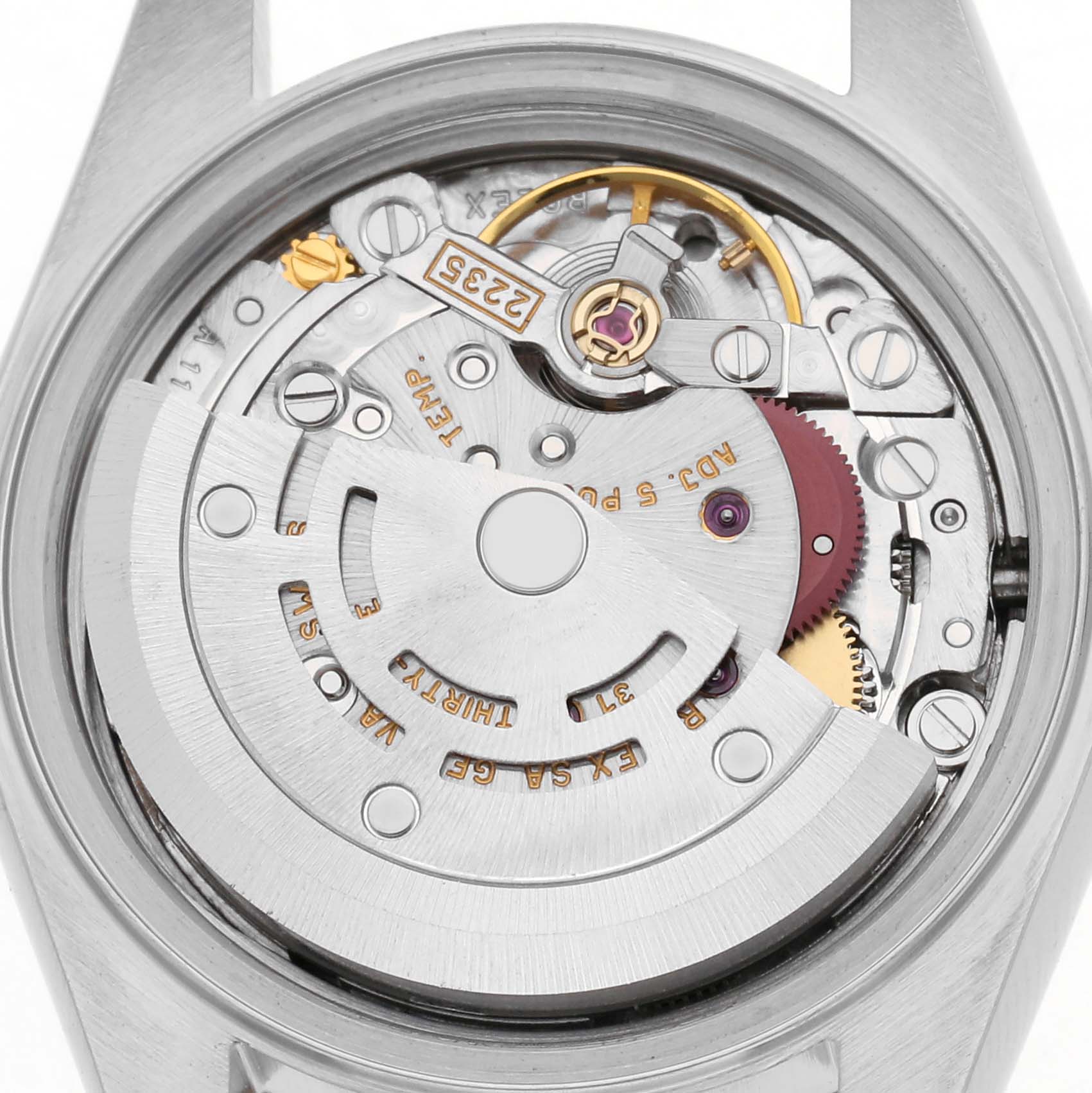The image shows a close-up of the movement mechanism from the back of a Rolex Datejust 79173 Women's Steel and Gold (two tone) Silver Dial 79173 Women's Steel and Gold (two tone) Silver Dial watch.