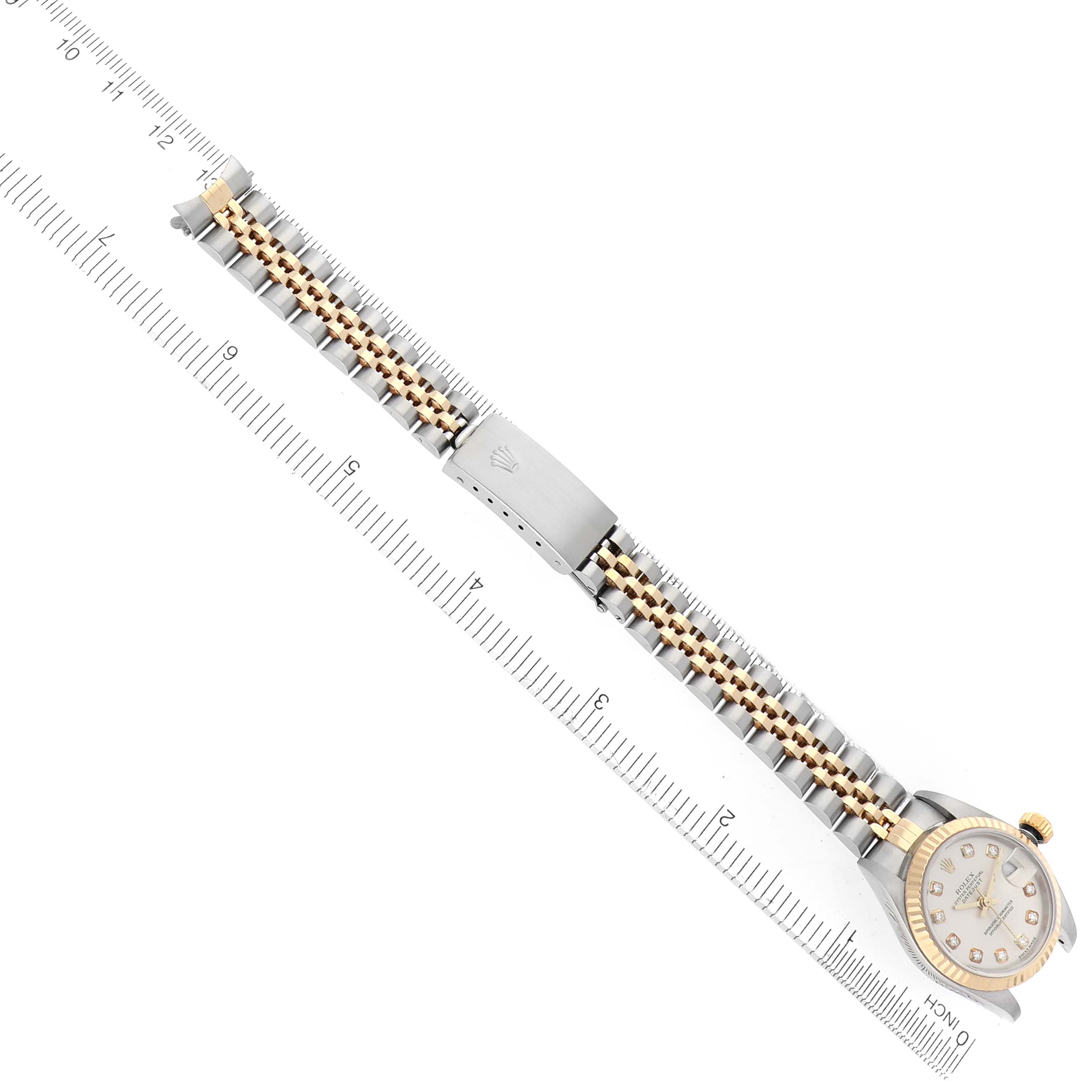 The Rolex Datejust 79173 Women's Steel and Gold (two tone) Silver Dial 79173 Women's Steel and Gold (two tone) Silver Dial watch is shown from an overhead angle, displaying the face, clasp, and two-tone bracelet.
