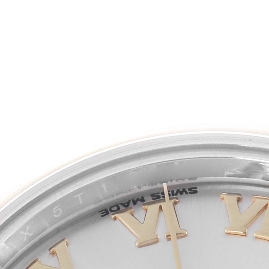 The image shows a partial close-up of the watch face and edge of the Rolex Datejust 279163 Women's Steel and Gold (two tone) Silver Dial 279163 Women's Steel and Gold (two tone) Silver Dial, featuring Roman numerals and the “Swiss Made” text.