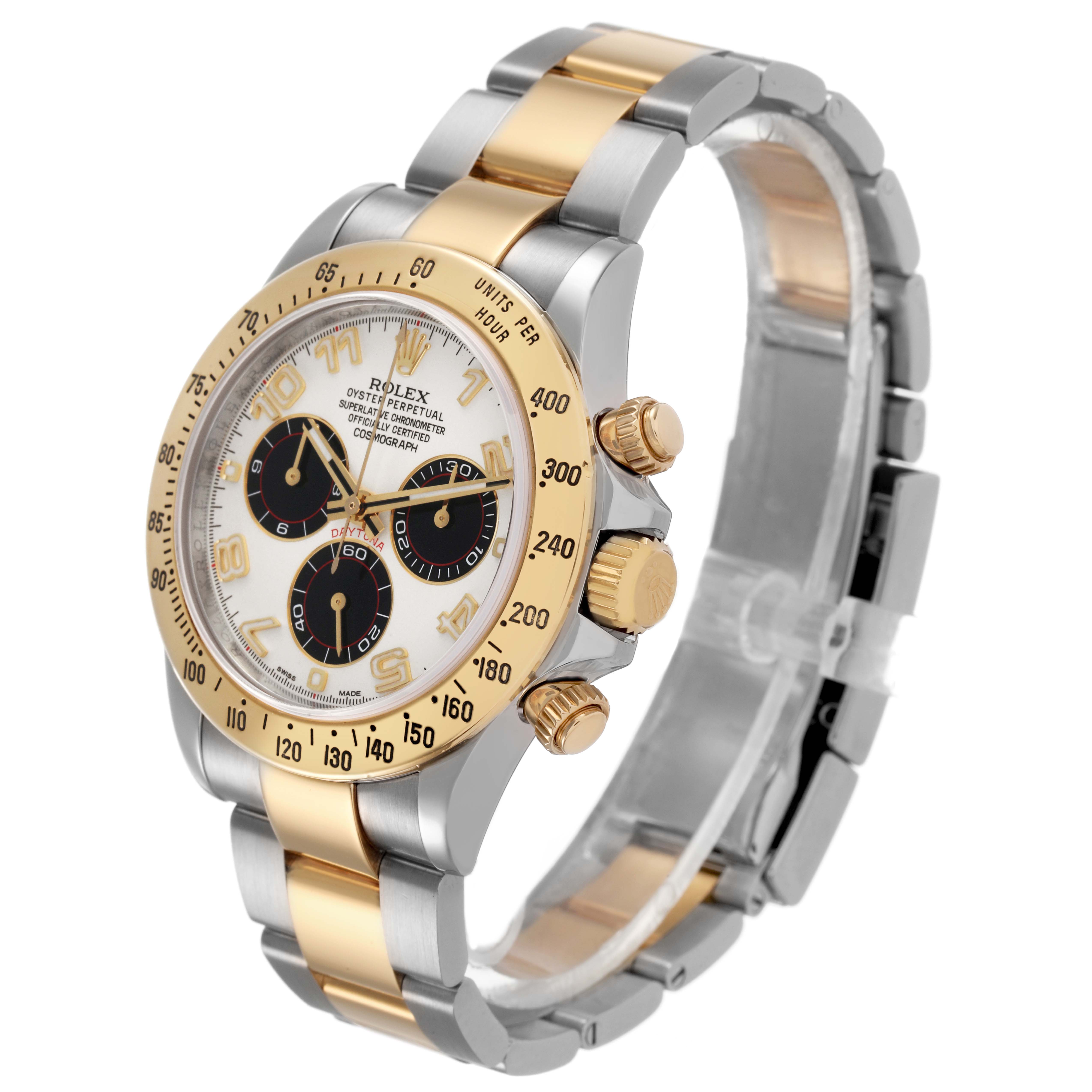 The Rolex Daytona 116523 Men's Steel and Gold (two tone) Silver Dial watch is shown at an angled side view, highlighting the bezel, dial, and bracelet.