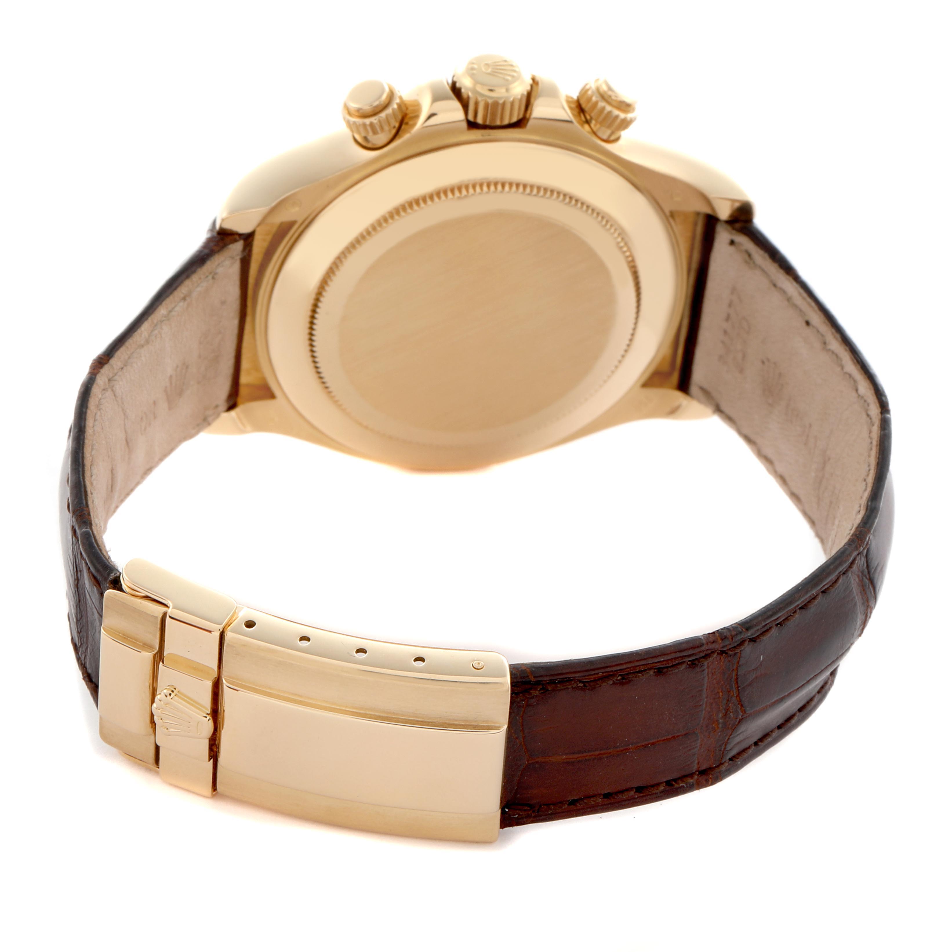 The image shows the back view of a Rolex Daytona 116518 Men
s Yellow Gold Mother of Pearl Dial 116518 Men
s Yellow Gold Mother of Pearl Dial with a focus on the clasp, crown, and leather strap.