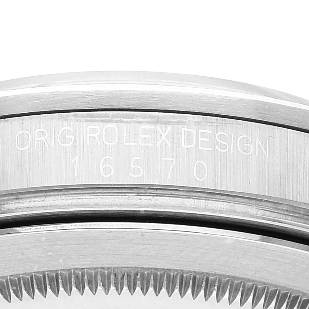 This image shows a close-up of the bezel and mid-case side of a Rolex Explorer 16570 Men's Stainless Steel Black Dial 16570 Men's Stainless Steel Black Dial watch, model number 16570.