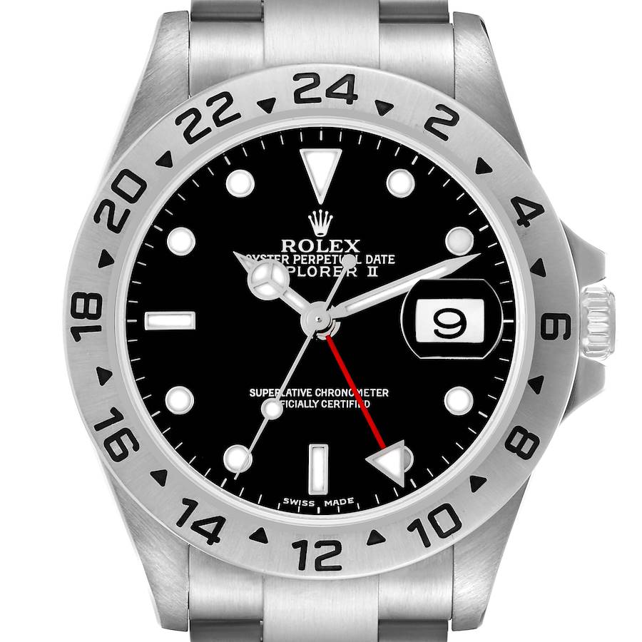The image shows a Rolex Explorer II watch face straight on, highlighting the dial, hands, bezel, and date window.