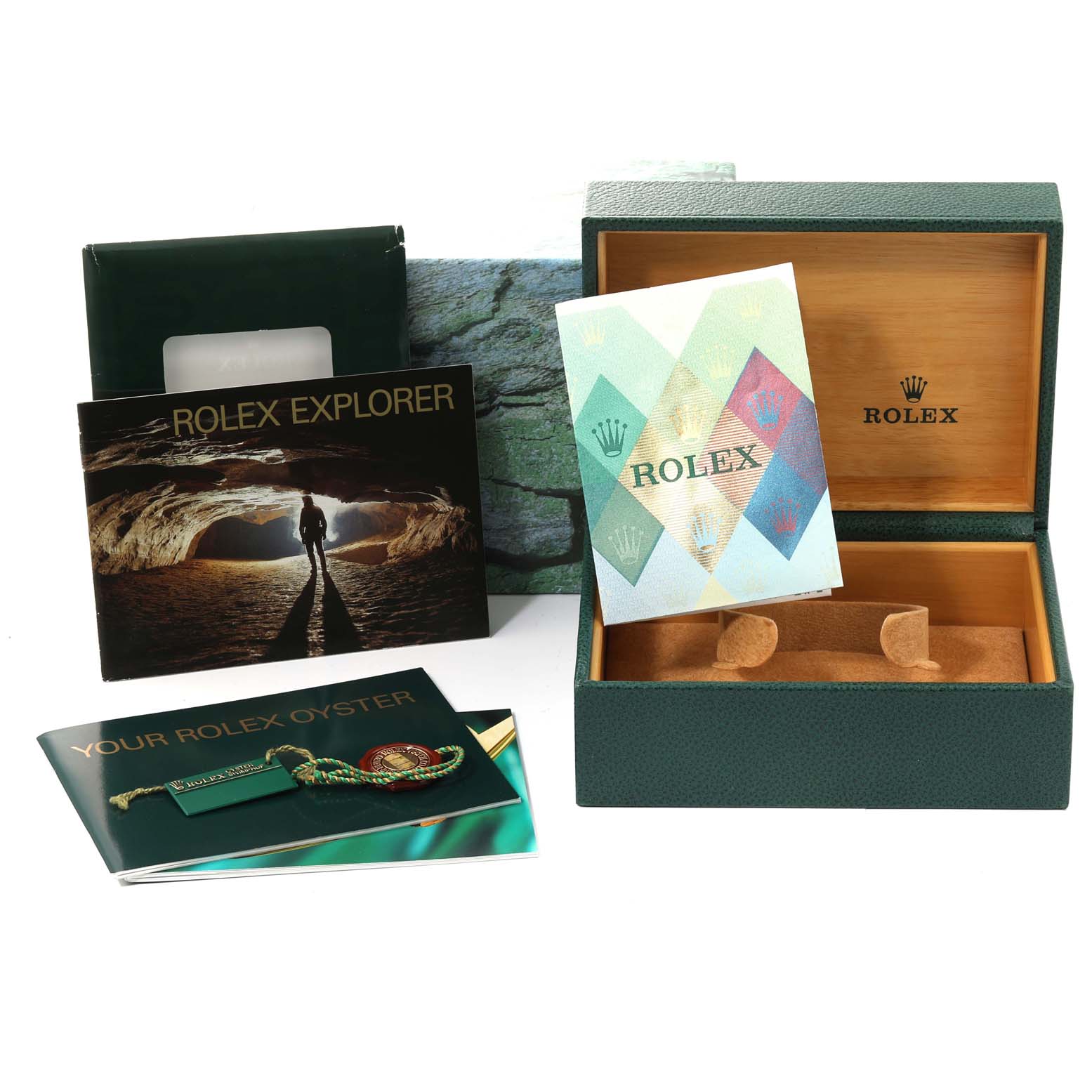 The image shows the box and booklet accessories for the Rolex Explorer 16570 Men's Stainless Steel White Dial 16570 Men's Stainless Steel White Dial model, presented from a front angle.