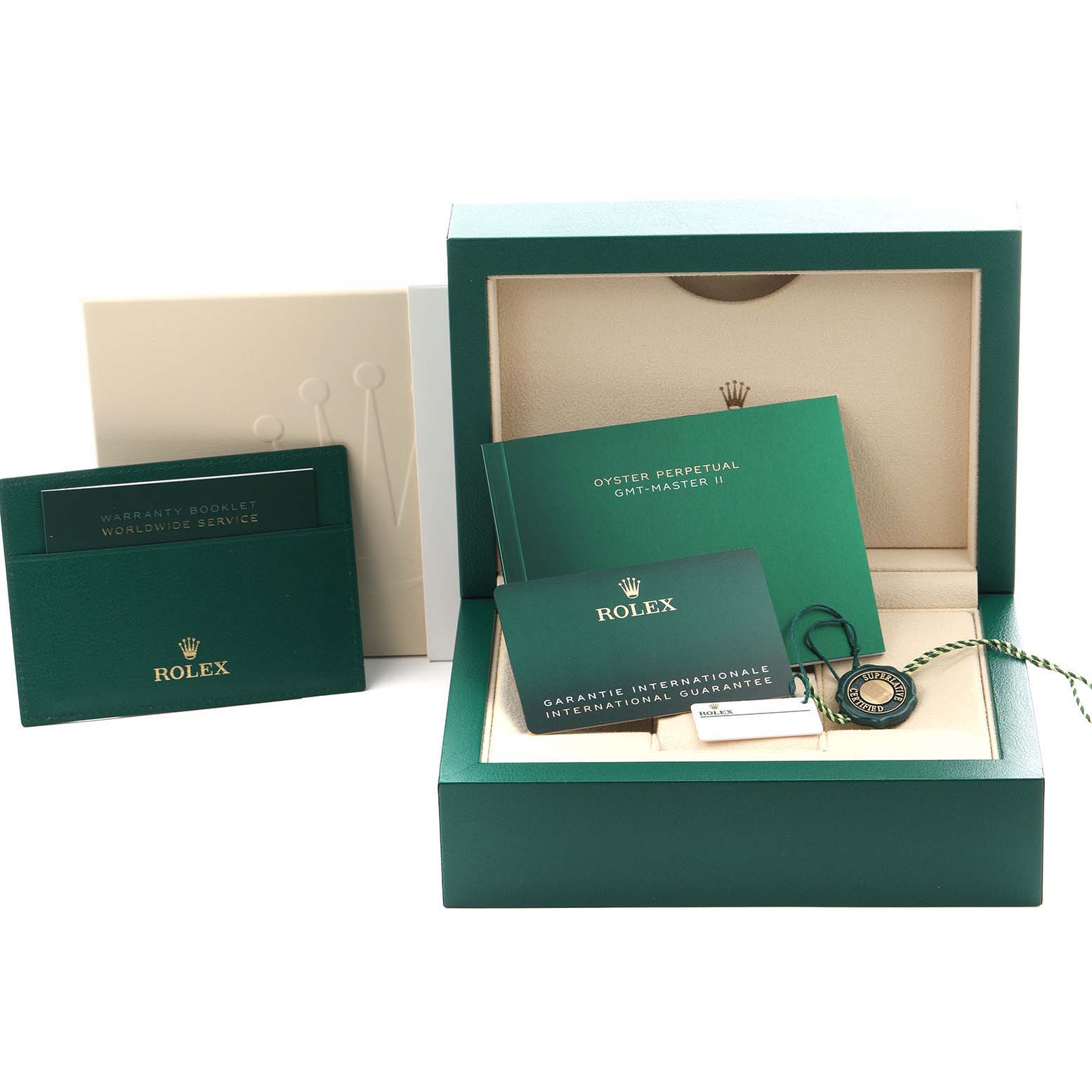 The image shows a Rolex GMT-Master 126711CHNR Men's Steel and Gold (two tone) Black Dial box with warranty booklets, an international guarantee card, and a tag, viewed from the front.
