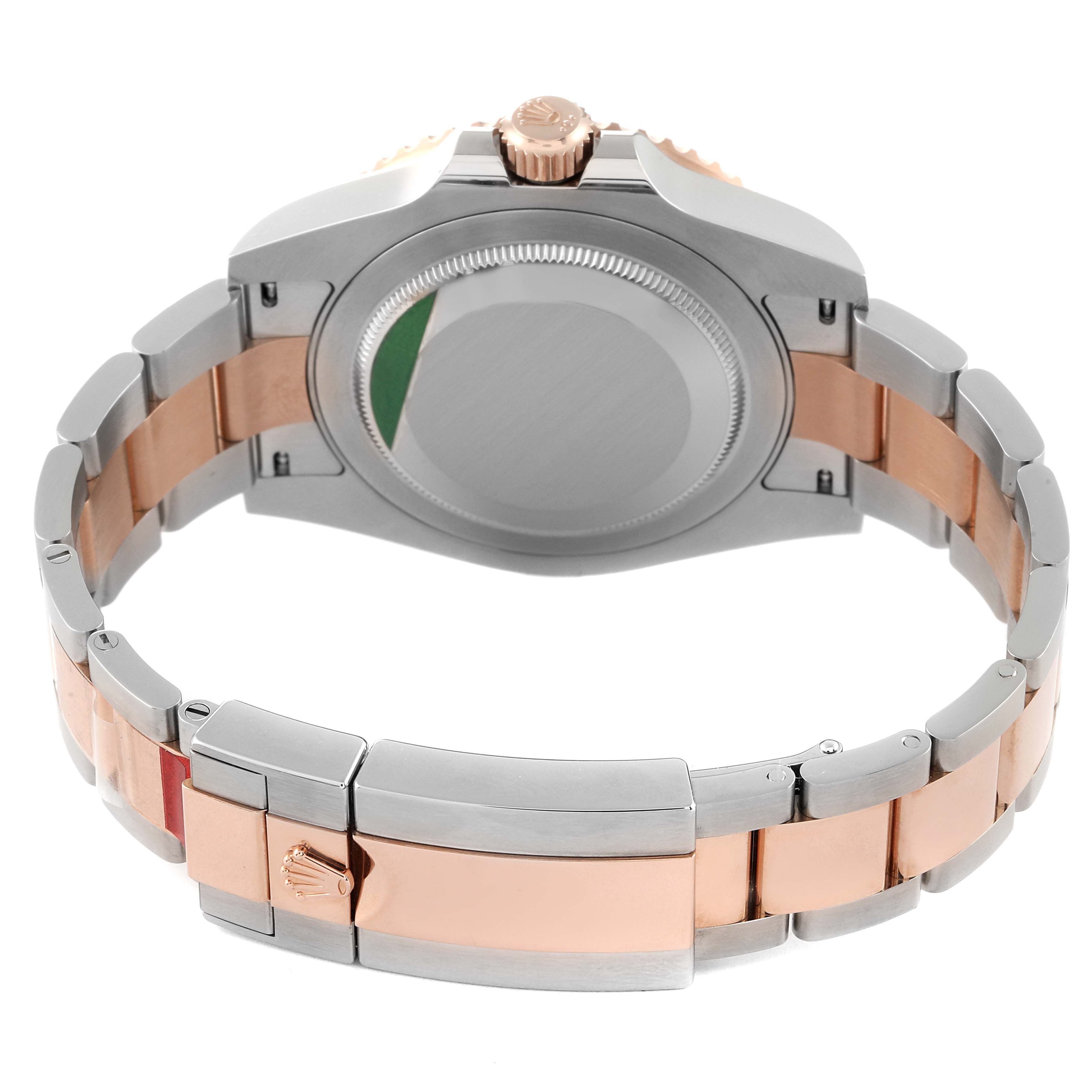 This image shows the back case and bracelet of a Rolex GMT-Master 126711 Men's Steel and Gold (two tone) Black Dial 126711 Men's Steel and Gold (two tone) Black Dial watch with a stainless steel and rose gold finish.