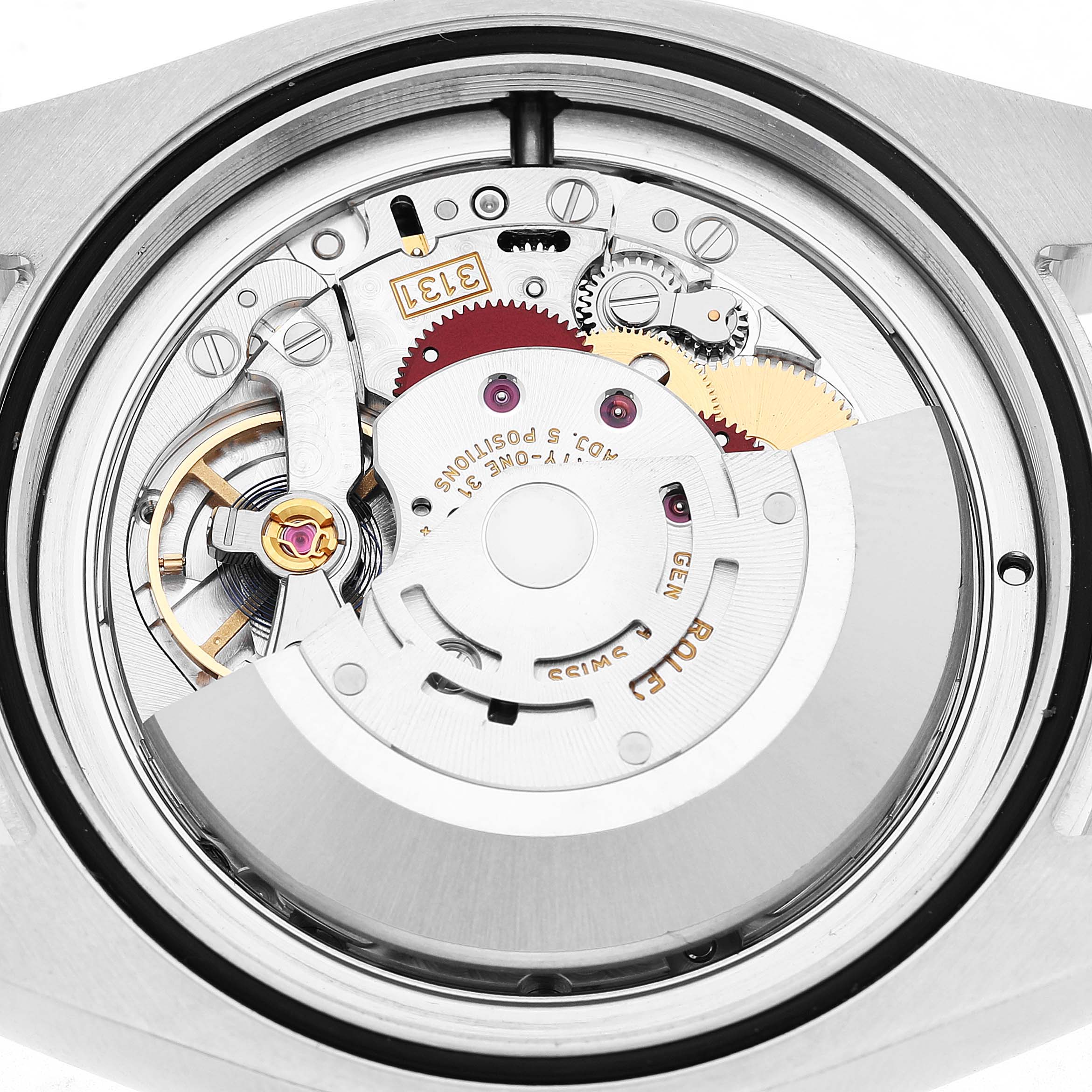 The image shows the movement of a Rolex Milgauss M116400GV Men's Stainless Steel Blue Dial watch from a back view, highlighting gears and the rotor.