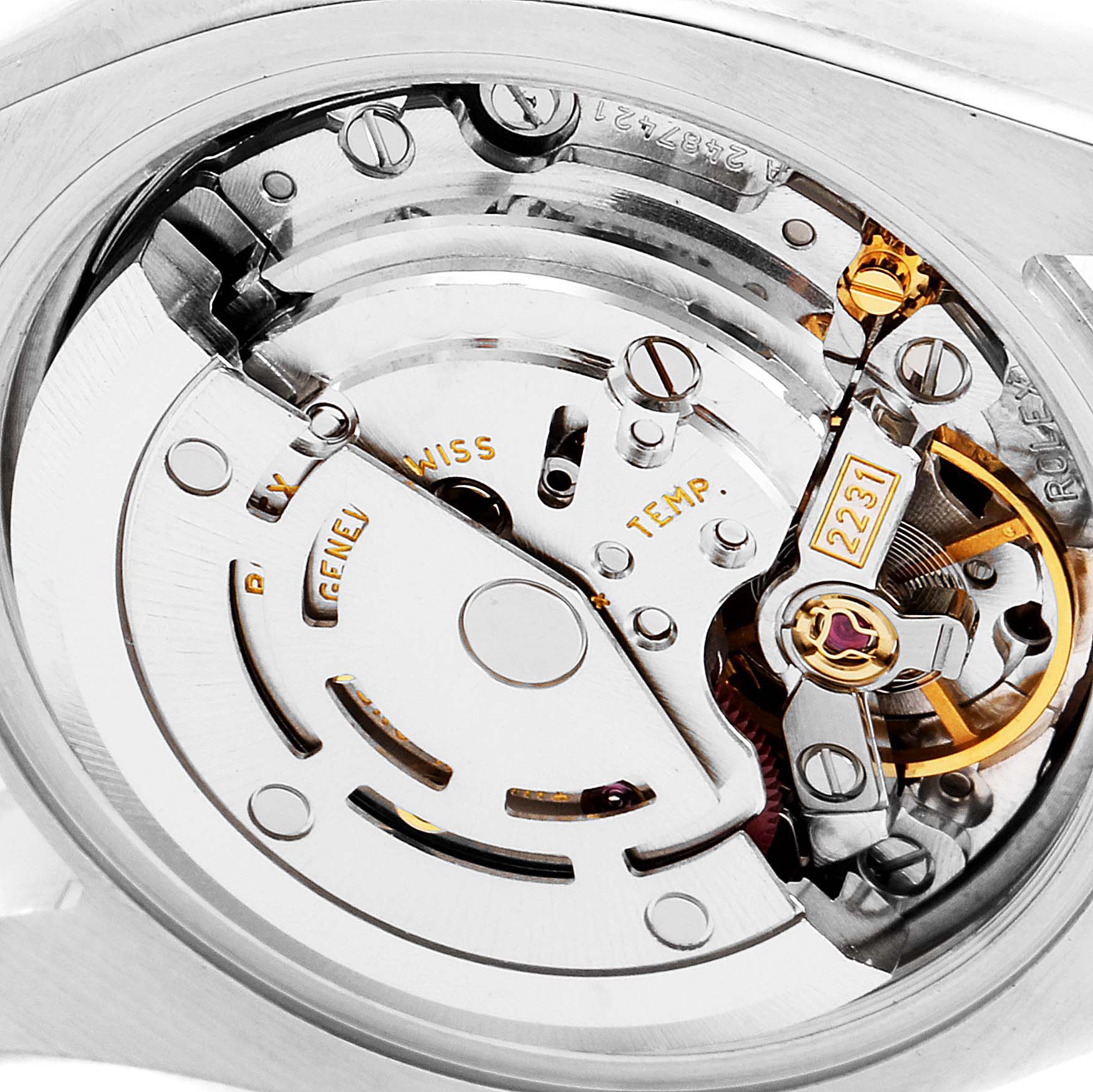 This close-up image of a Rolex Oyster Perpetual 176200 Women
s Stainless Steel Pink Dial 176200 Women
s Stainless Steel Pink Dial watch shows the intricate details of its internal movement components.