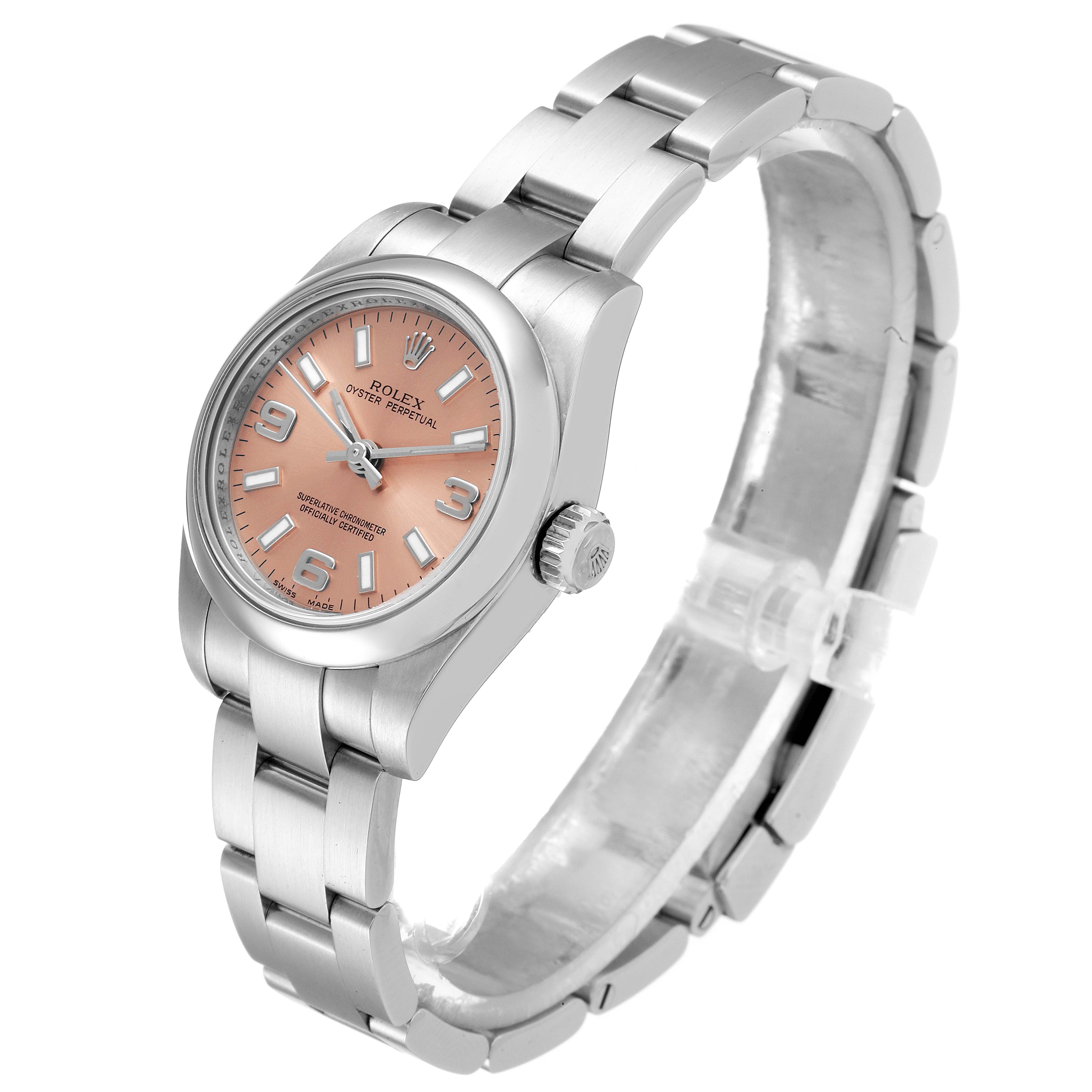 The image shows a Rolex Oyster Perpetual 176200 Women
s Stainless Steel Pink Dial 176200 Women
s Stainless Steel Pink Dial watch from an angled side view, highlighting its case, bracelet, crown, and dial.