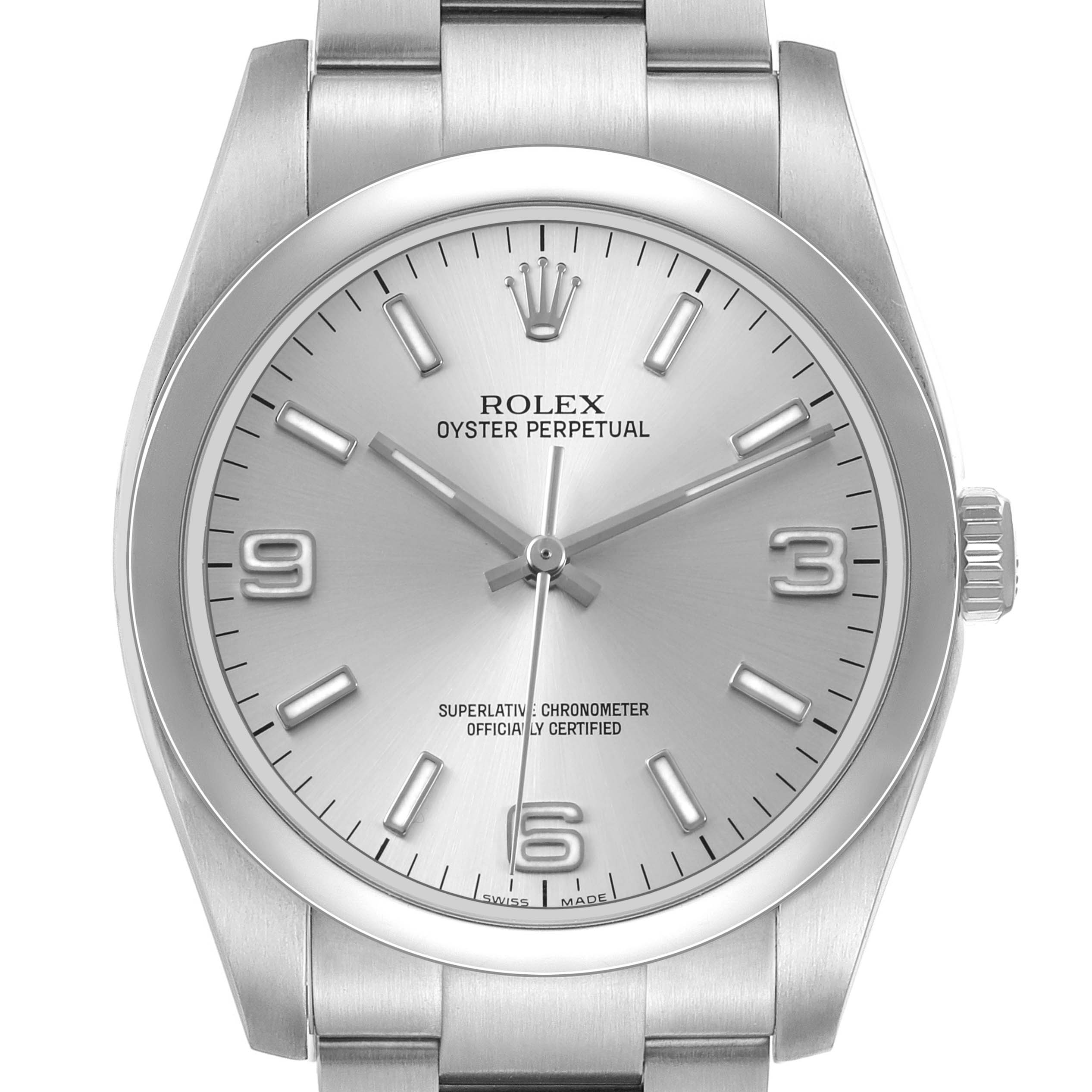 The Rolex Oyster Perpetual 116000 Men's Stainless Steel Silver Dial watch is shown from a front angle, highlighting the dial, hour markers, hands, and crown.