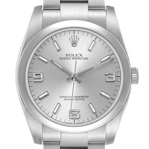 The Rolex Oyster Perpetual 116000 Men's Stainless Steel Silver Dial watch is shown from a front angle, highlighting its dial, bezel, and part of the bracelet.