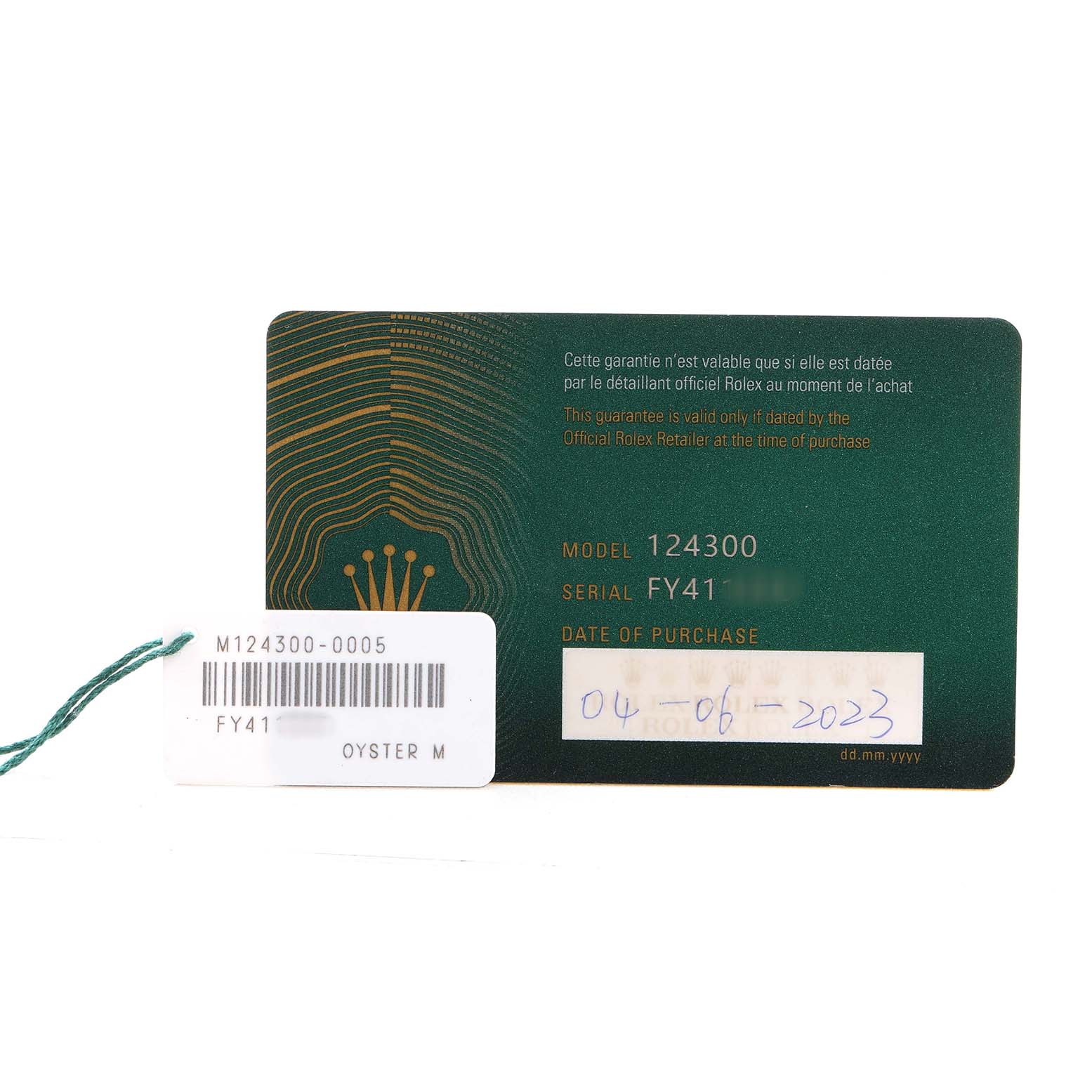 The image shows a Rolex Oyster Perpetual M124300-0005 Men's Stainless Steel Green Dial model card with tag, revealing model, serial number, and purchase date details.