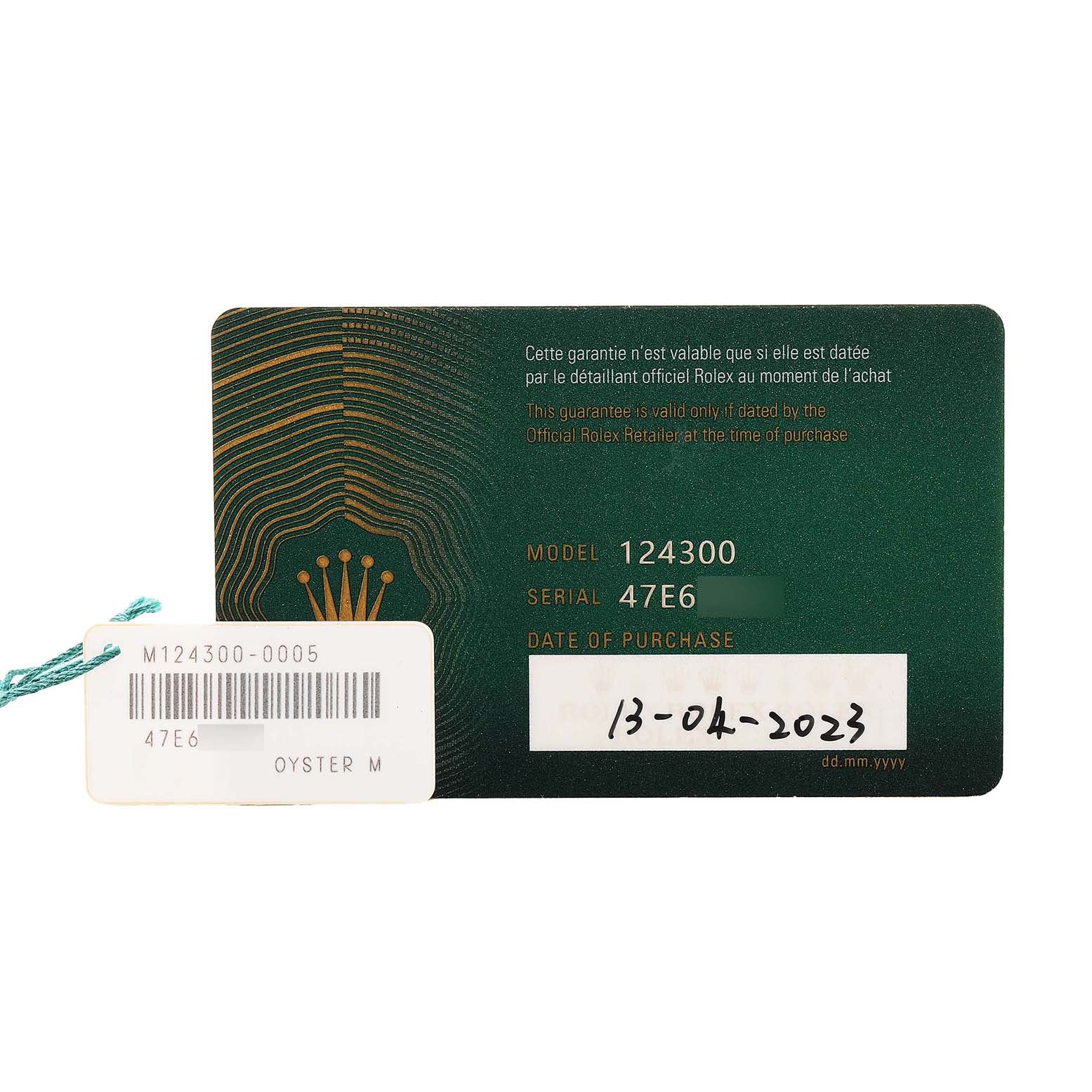 The image shows the guarantee card and tag for a Rolex Oyster Perpetual M124300-0005 Men's Stainless Steel Green Dial model 124300, including serial and purchase details.