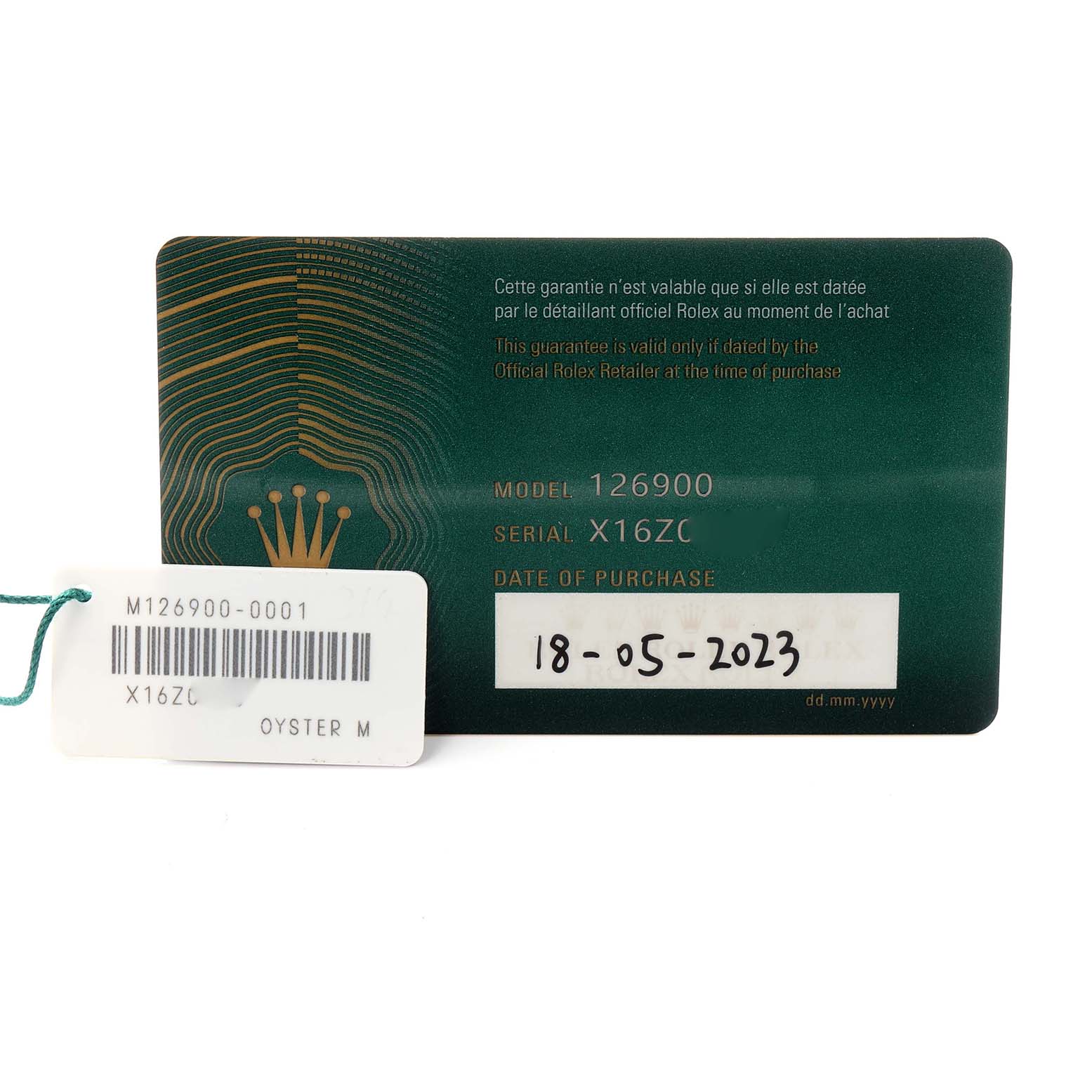 The image shows a warranty card and a tag for the Rolex Air-King 126900 Men's Stainless Steel Black Dial 126900 Men's Stainless Steel Black Dial model 126900, displaying details like the serial number and purchase date.