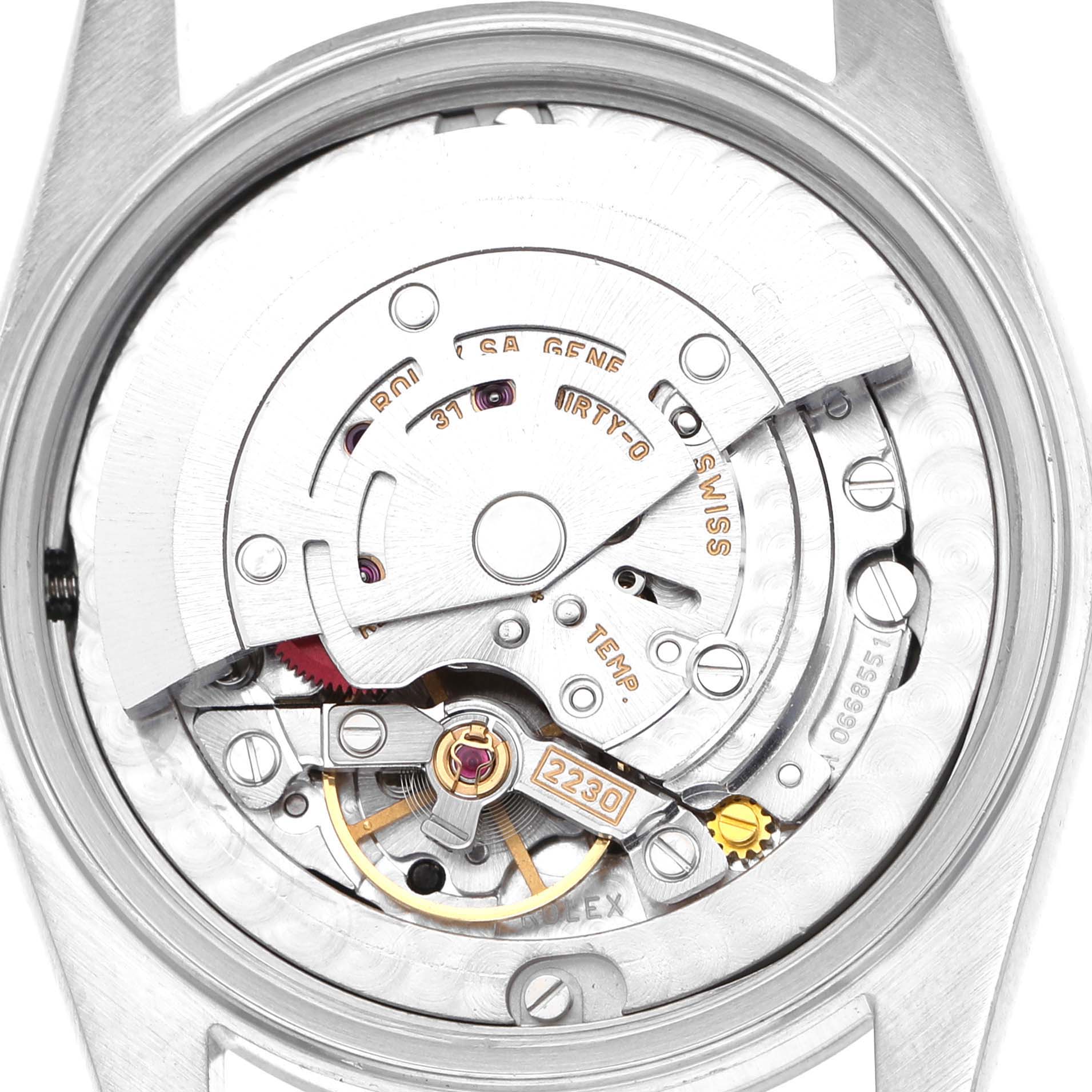 The image shows the movement and inner mechanism of a Rolex Oyster Perpetual 77080 Women's Stainless Steel Black Dial watch from a back view.