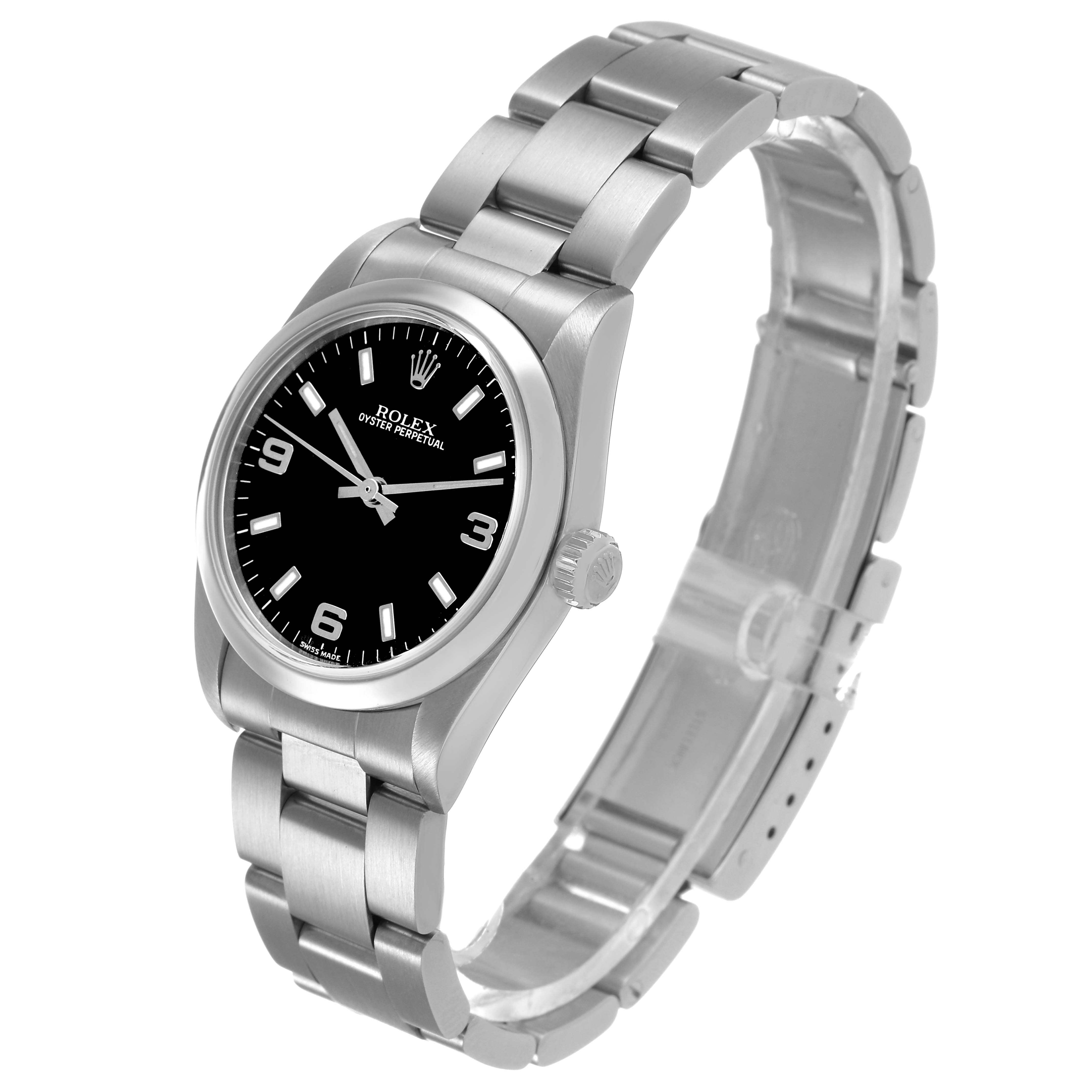 The Rolex Oyster Perpetual 77080 Women's Stainless Steel Black Dial watch is shown at a tilted angle, displaying the face, bracelet, crown, and clasp.