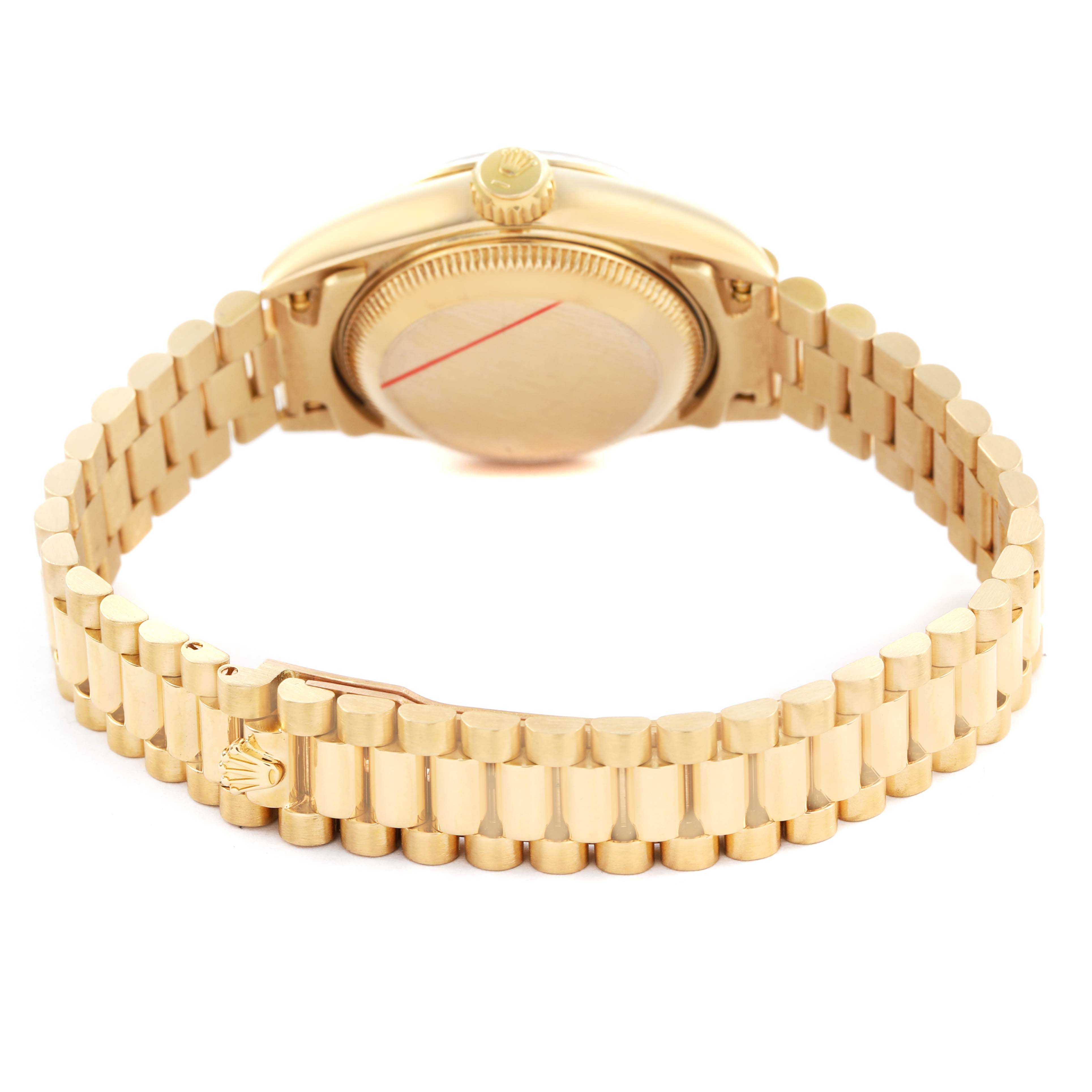 The image shows the back of a Rolex President 69178 Women's Yellow Gold Champagne Dial model watch, highlighting the bracelet and caseback.