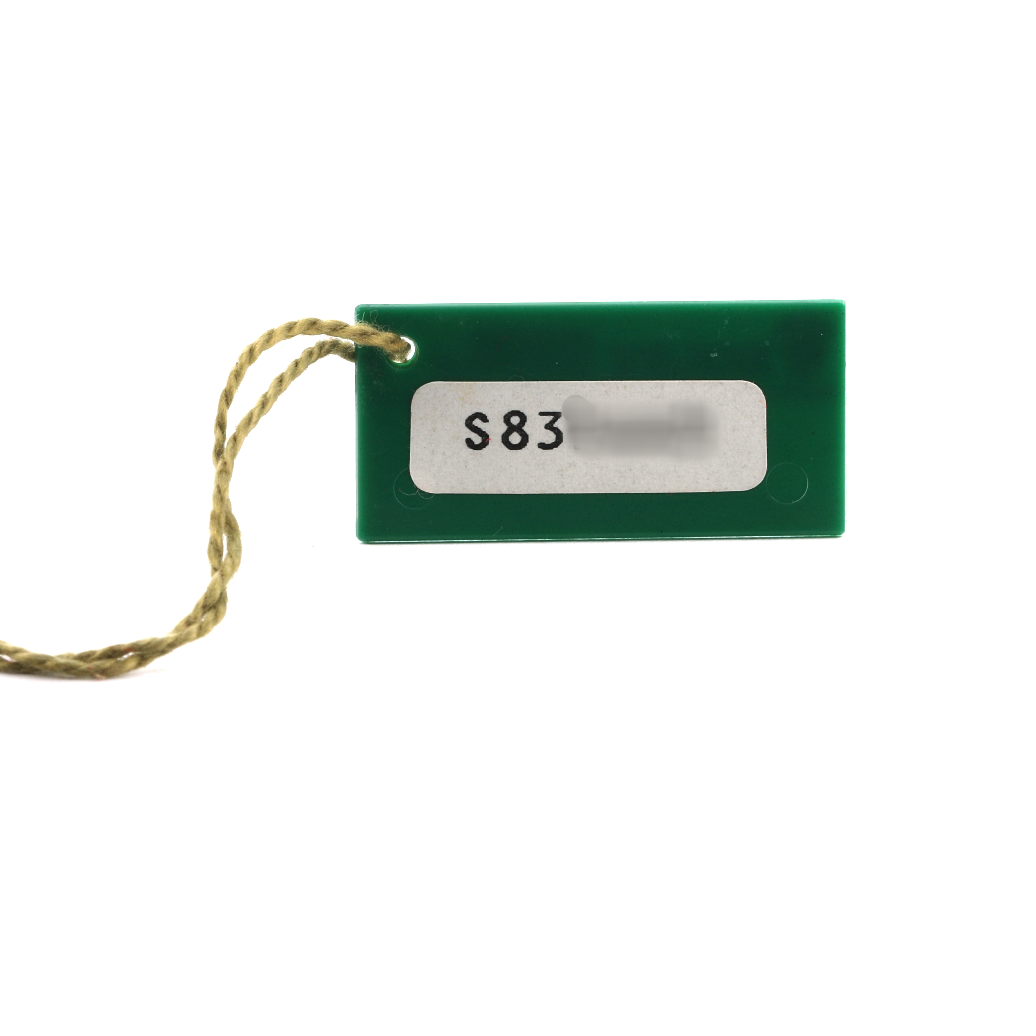 The image shows a green tag with a string, typically used as an accessory or identifier for the Rolex President 69178 Men's Yellow Gold Champagne Dial model watch.
