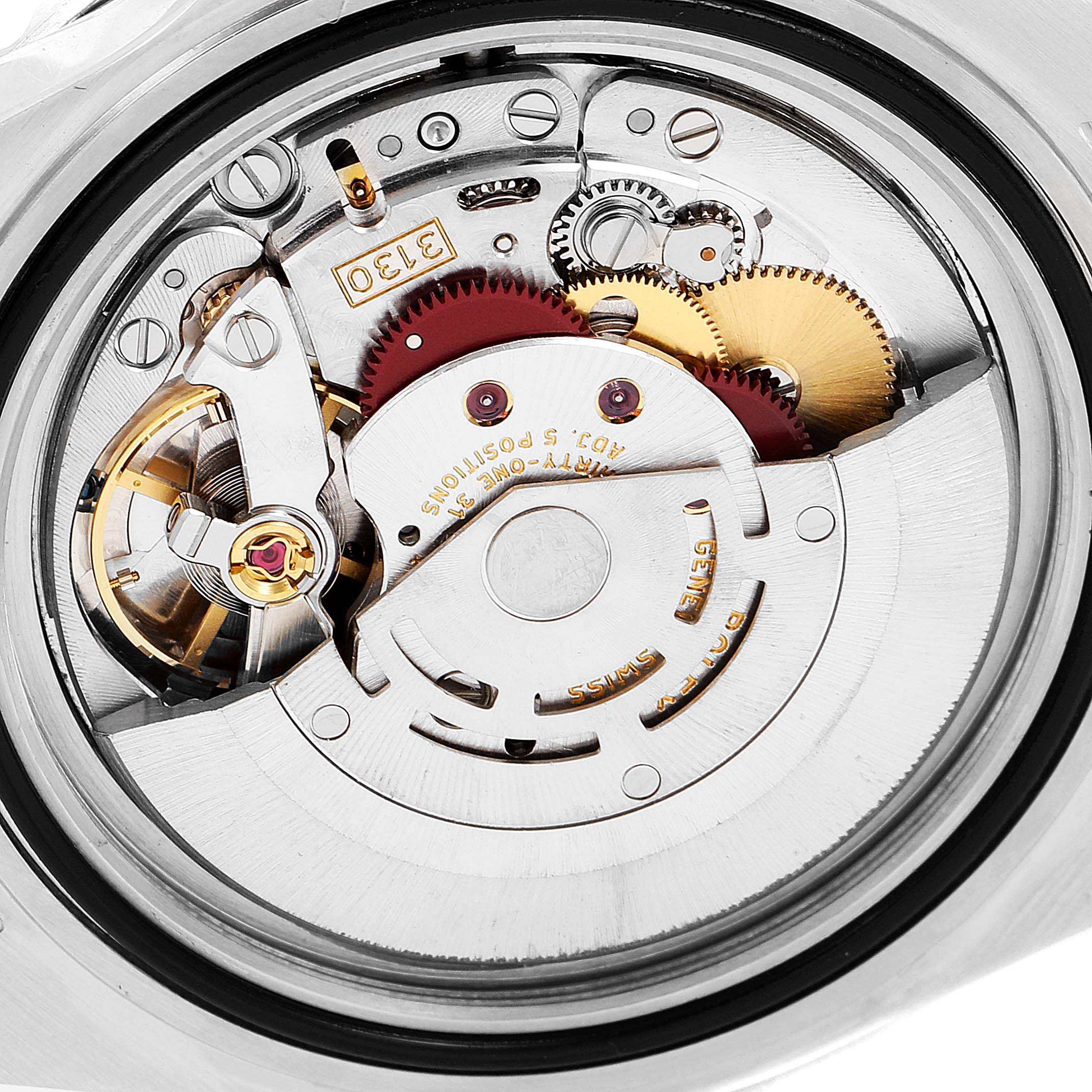 This image shows an up-close view of the exposed mechanical movement inside a Rolex Submariner 14060 Men
s Stainless Steel Black Dial 14060 Men
s Stainless Steel Black Dial watch.