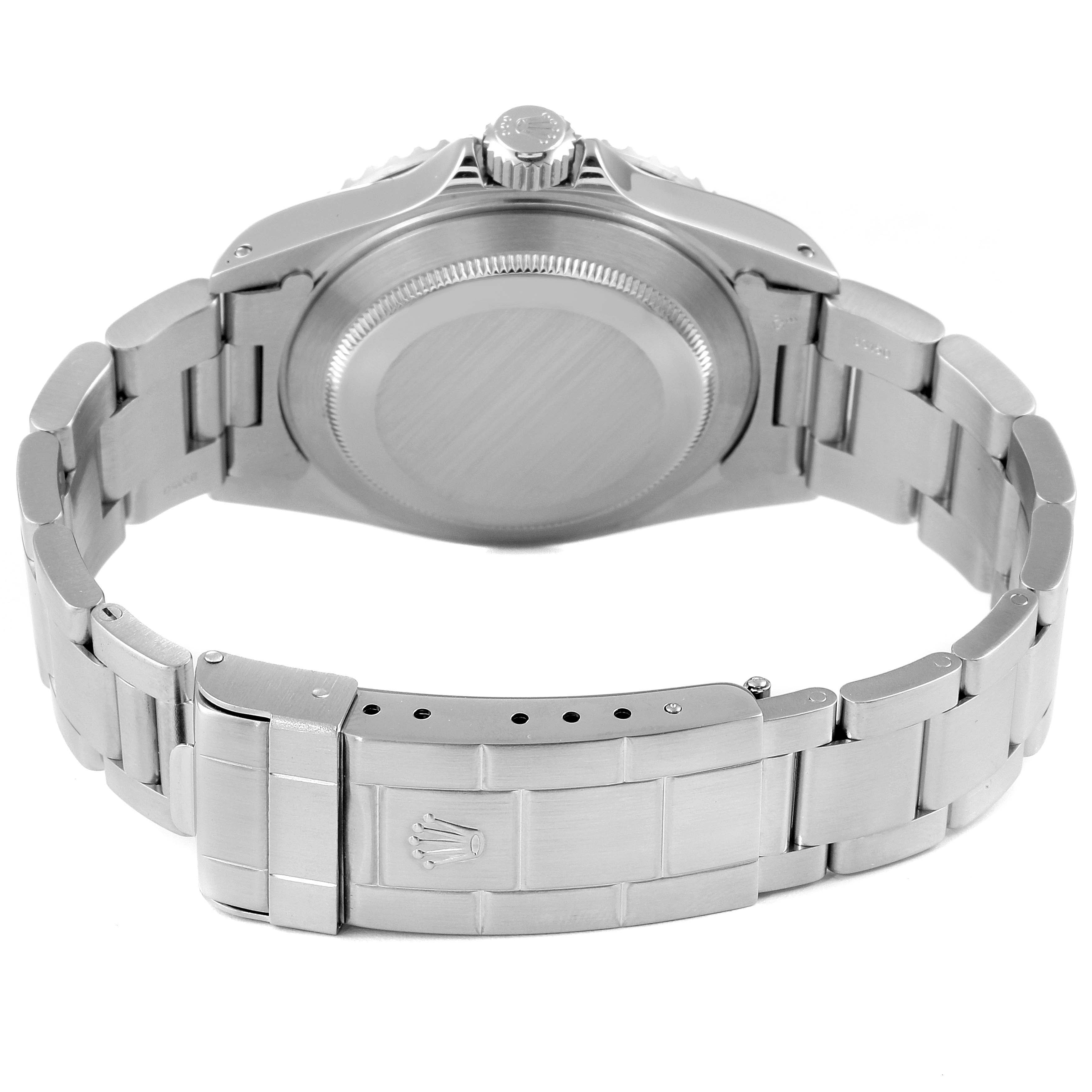 The image shows the back and bracelet clasp of a Rolex Submariner 14060 Men
s Stainless Steel Black Dial 14060 Men
s Stainless Steel Black Dial watch from a rear angle.