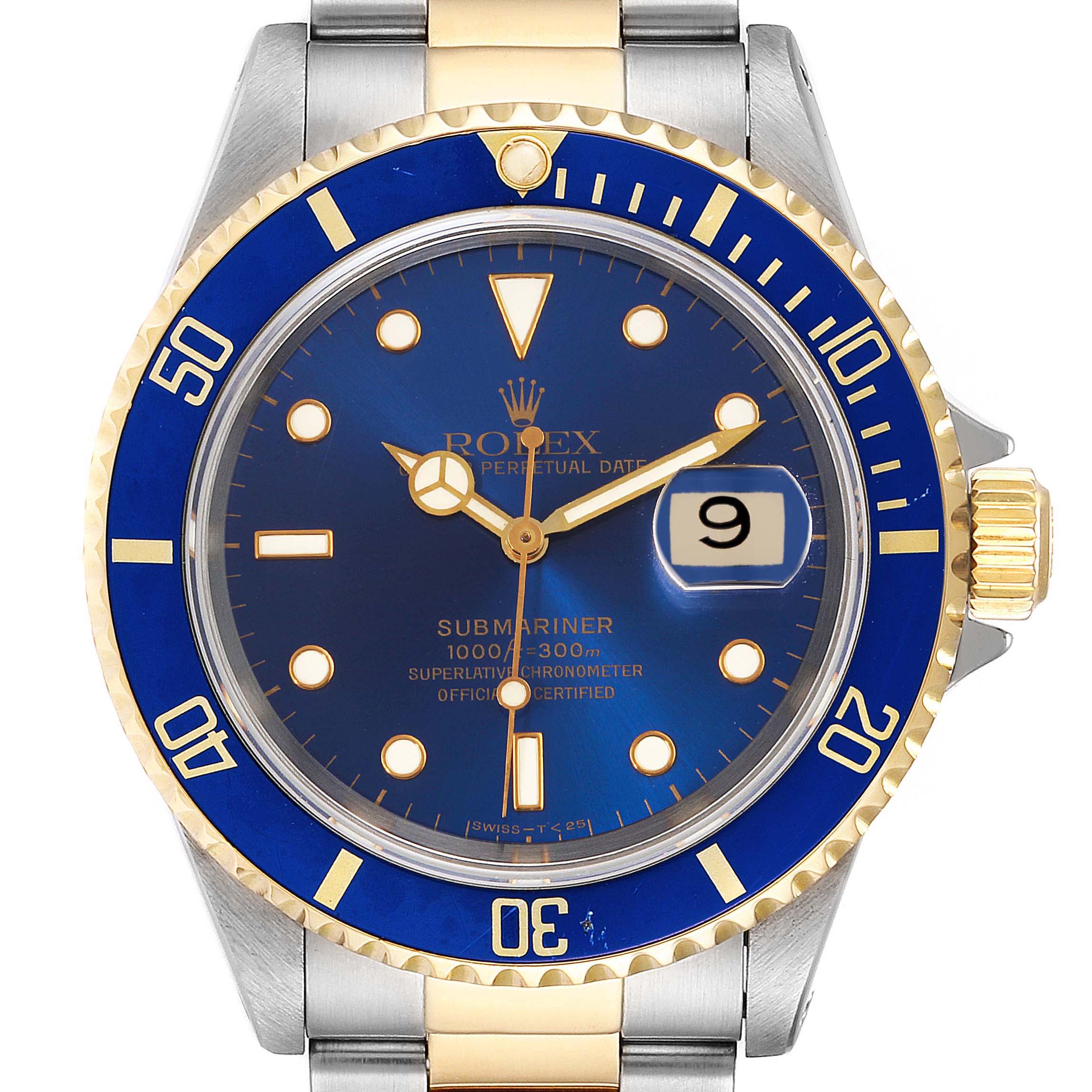 The image shows a frontal view of a Rolex Submariner 16613 Men
s Steel and Gold (two tone) Blue Dial 16613 Men
s Steel and Gold (two tone) Blue Dial watch with a blue dial, gold and silver bezel, and the date magnified.