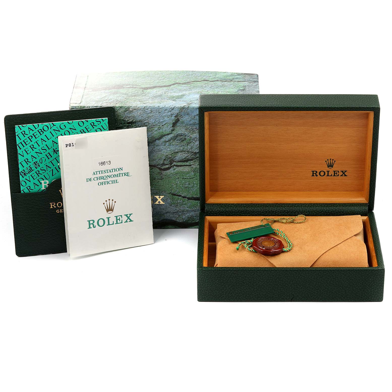 The image shows the packaging and accessories for a Rolex Submariner 16613 Men
s Steel and Gold (two tone) Blue Dial 16613 Men
s Steel and Gold (two tone) Blue Dial, including the outer box, manuals, and the inner watch box.