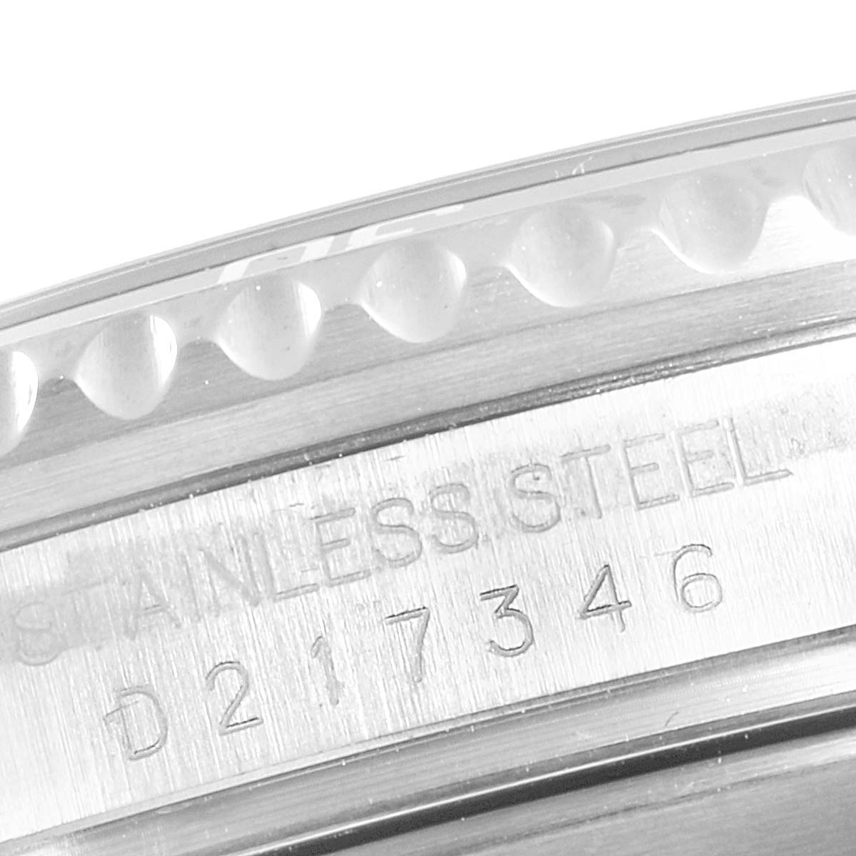 This image shows a close-up of the stainless steel bezel and engraving details of a Rolex Submariner 16610 Men
s Stainless Steel Black Dial 16610 Men
s Stainless Steel Black Dial watch.