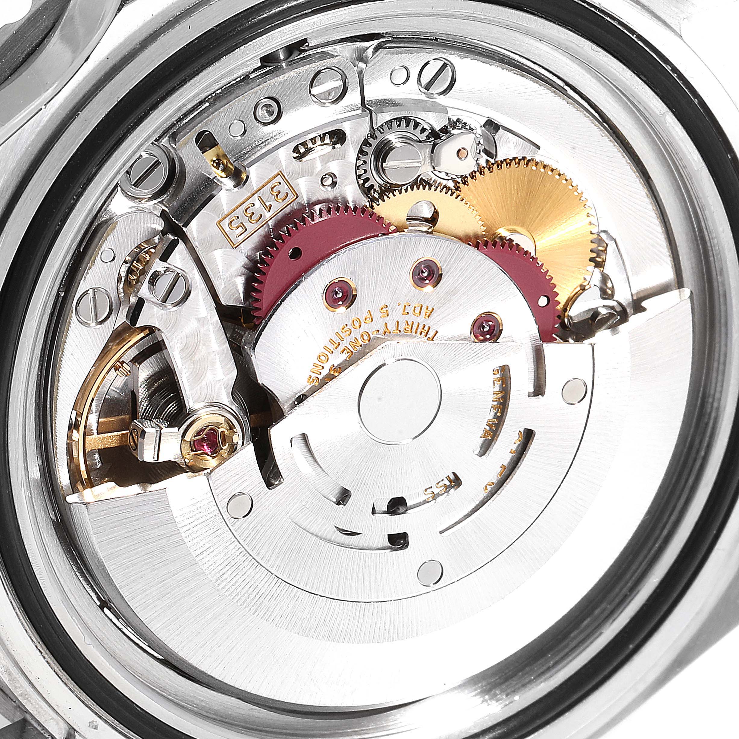 The image shows the intricate internal mechanism of the Rolex Submariner 16610 Men
s Stainless Steel Black Dial 16610 Men
s Stainless Steel Black Dial watch.