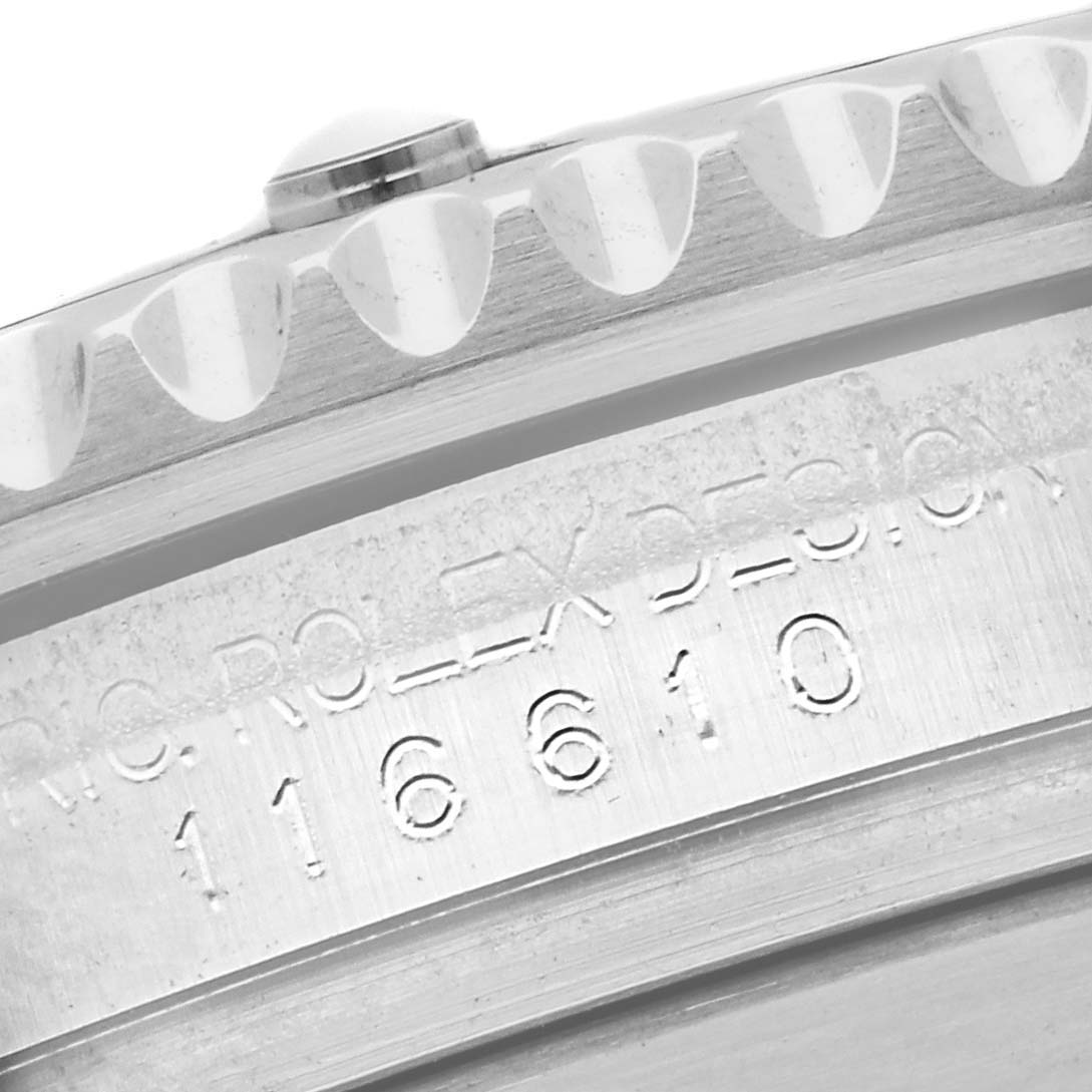 The image shows a close-up of the side of a Rolex Submariner 116610LN Men
s Stainless Steel Black Dial 116610LN Men
s Stainless Steel Black Dial, focusing on the engraved model number and part of the bezel.
