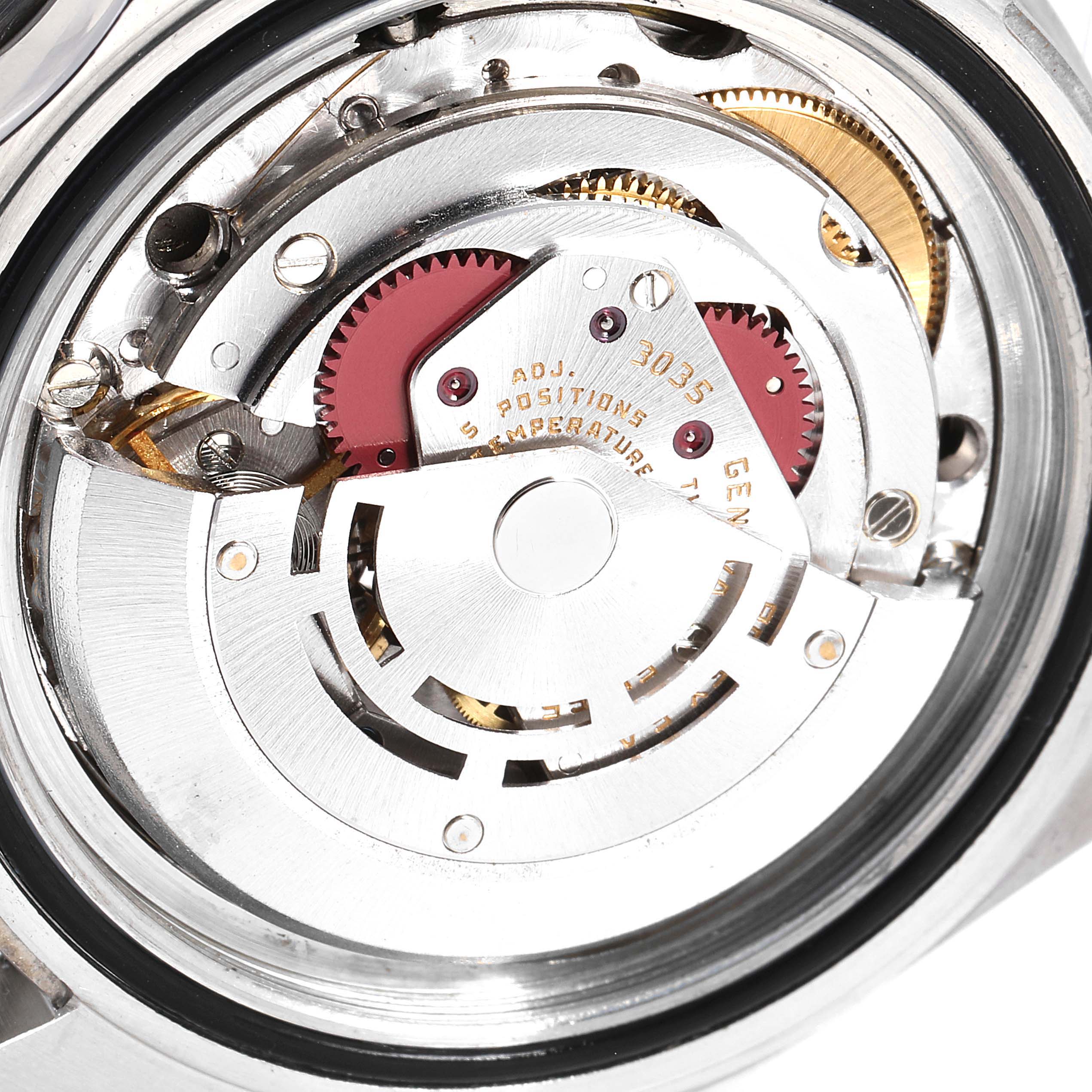 The image shows a close-up view of the movement mechanism inside a Rolex Submariner 16800 Men
s Stainless Steel Black Dial 16800 Men
s Stainless Steel Black Dial watch.