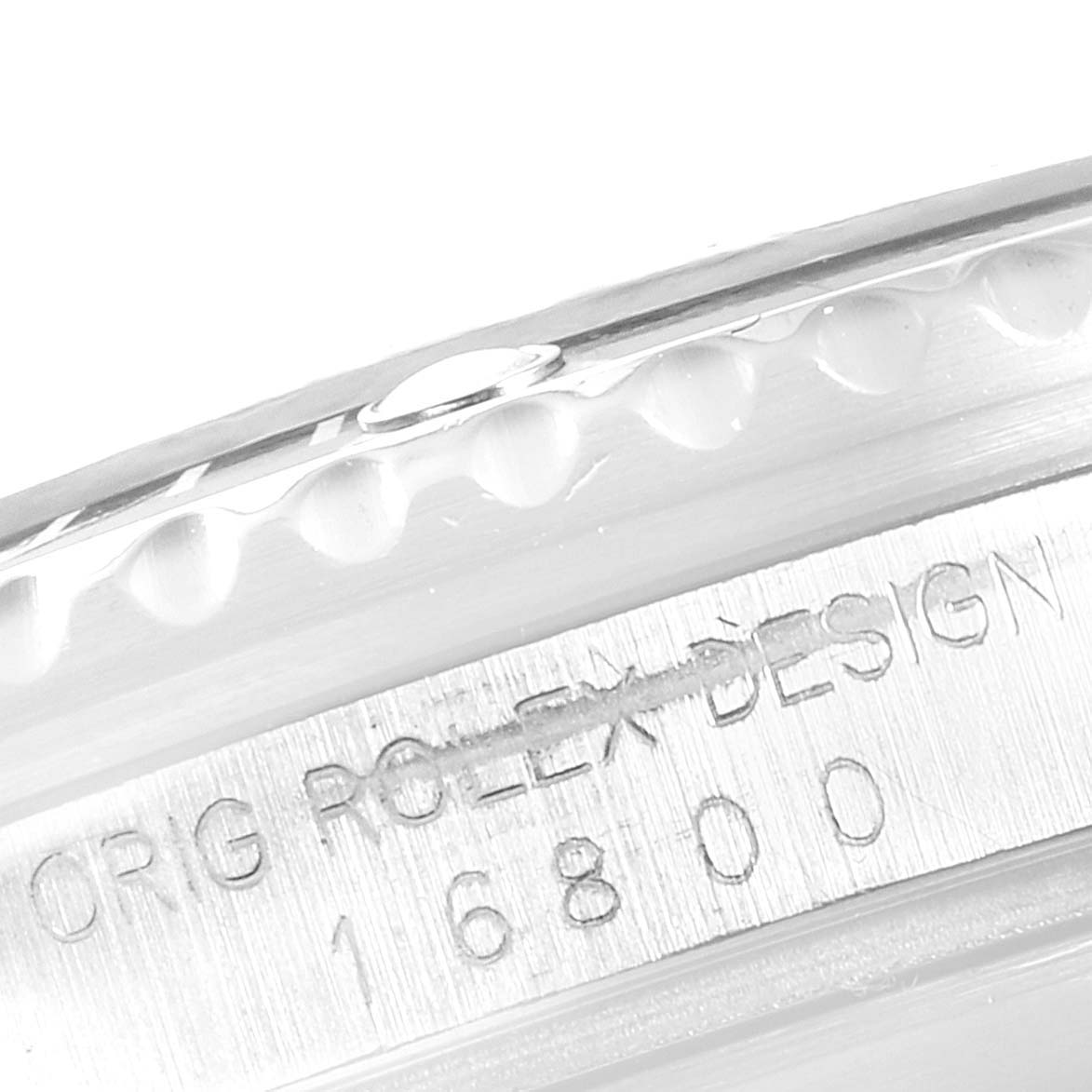 This image shows a close-up of the case side of a Rolex Submariner 16800 Men
s Stainless Steel Black Dial 16800 Men
s Stainless Steel Black Dial, focusing on the model number 16800 and brand engraving.