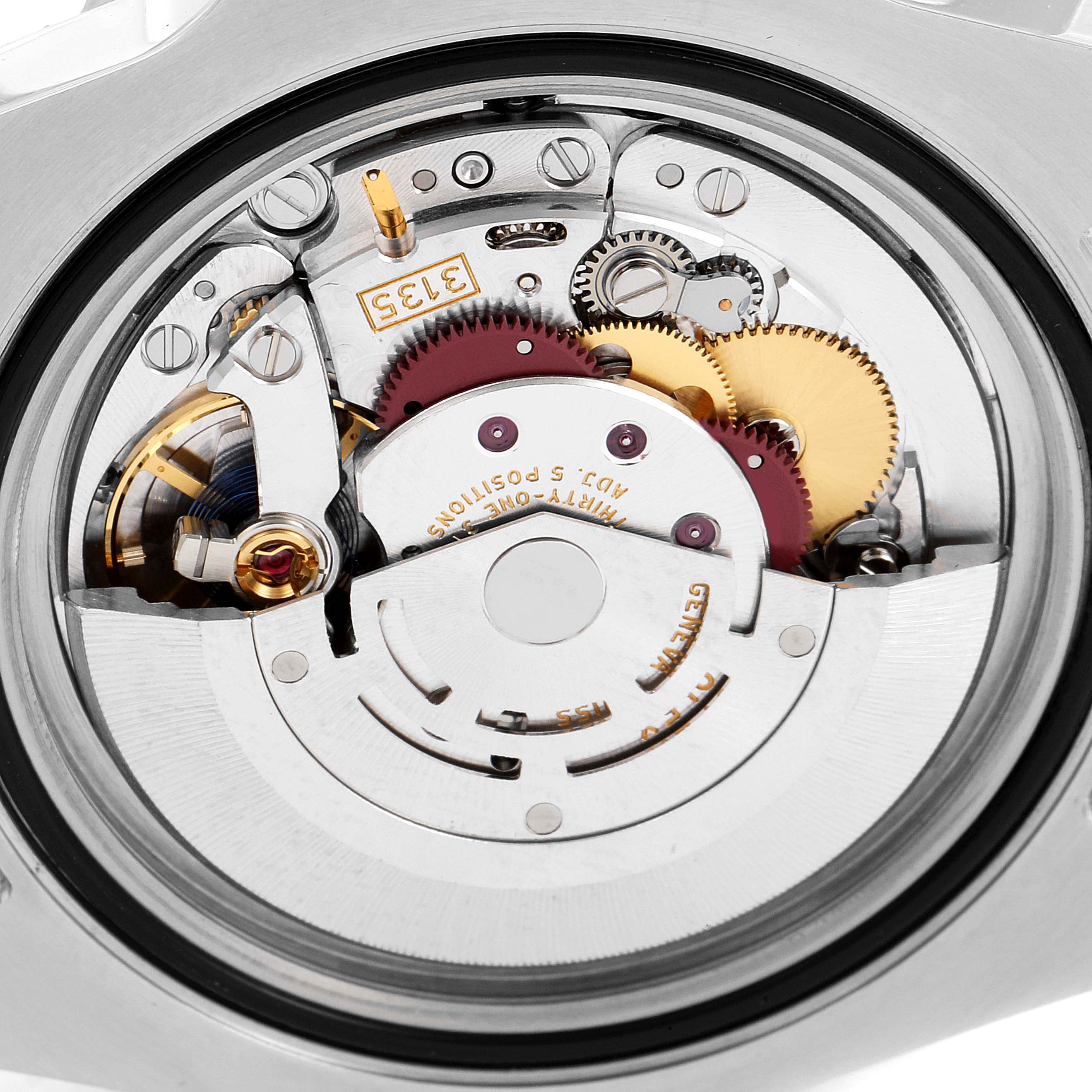 The image shows the intricate movement mechanism of a Rolex Submariner 116610LV Men
s Stainless Steel Green Dial 116610LV Men
s Stainless Steel Green Dial watch viewed from the back.