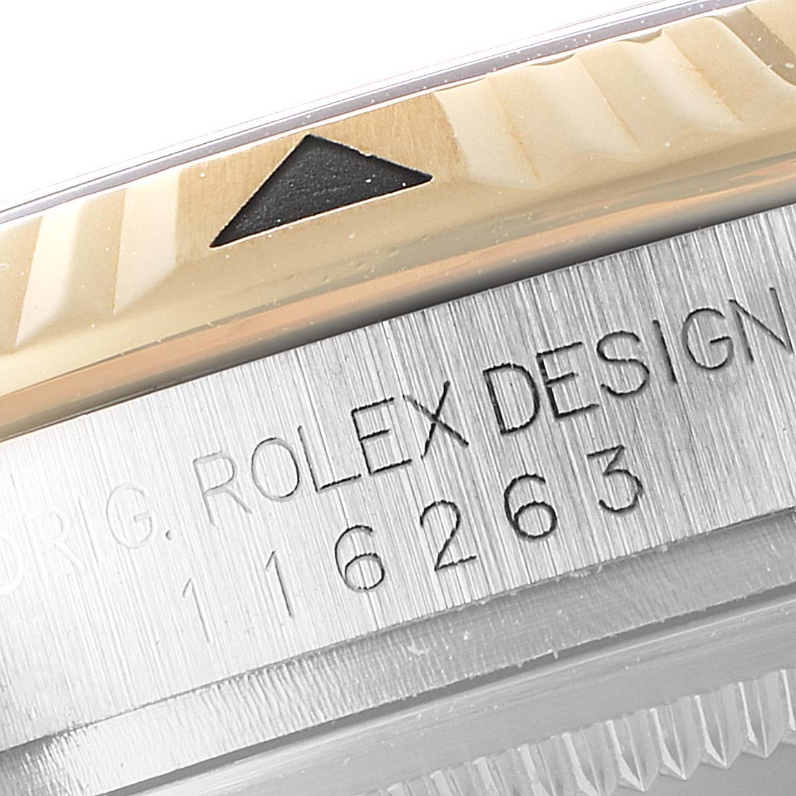 The image shows a close-up of the bezel and case with model number 116263 of the Rolex Turn-o-Graph 116263 Men
s Steel and Gold (two tone) Grey Dial 116263 Men
s Steel and Gold (two tone) Grey Dial.