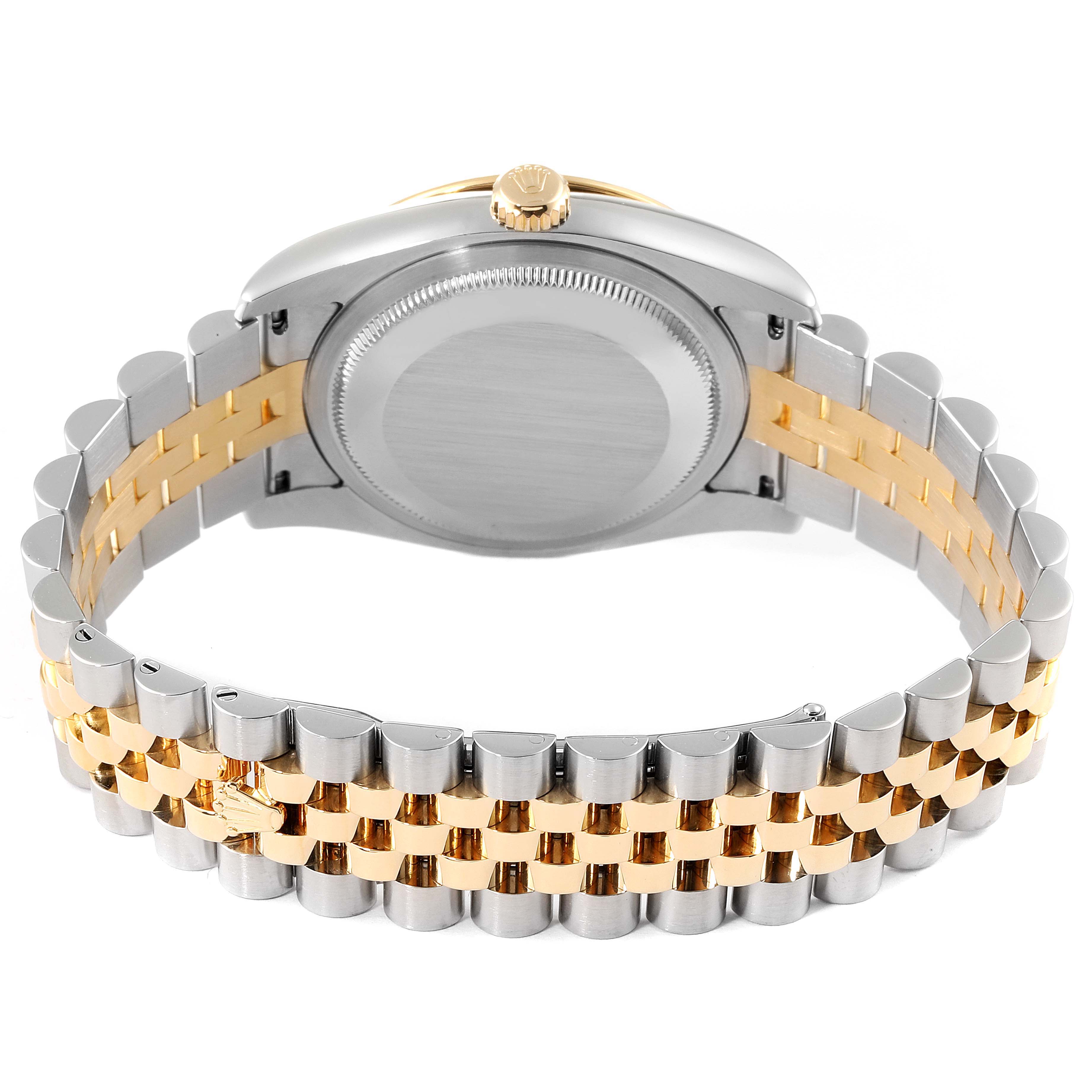 The Rolex Turn-o-Graph 116263 Men
s Steel and Gold (two tone) Grey Dial 116263 Men
s Steel and Gold (two tone) Grey Dial watch is shown from the back, highlighting the case back and two-tone bracelet.