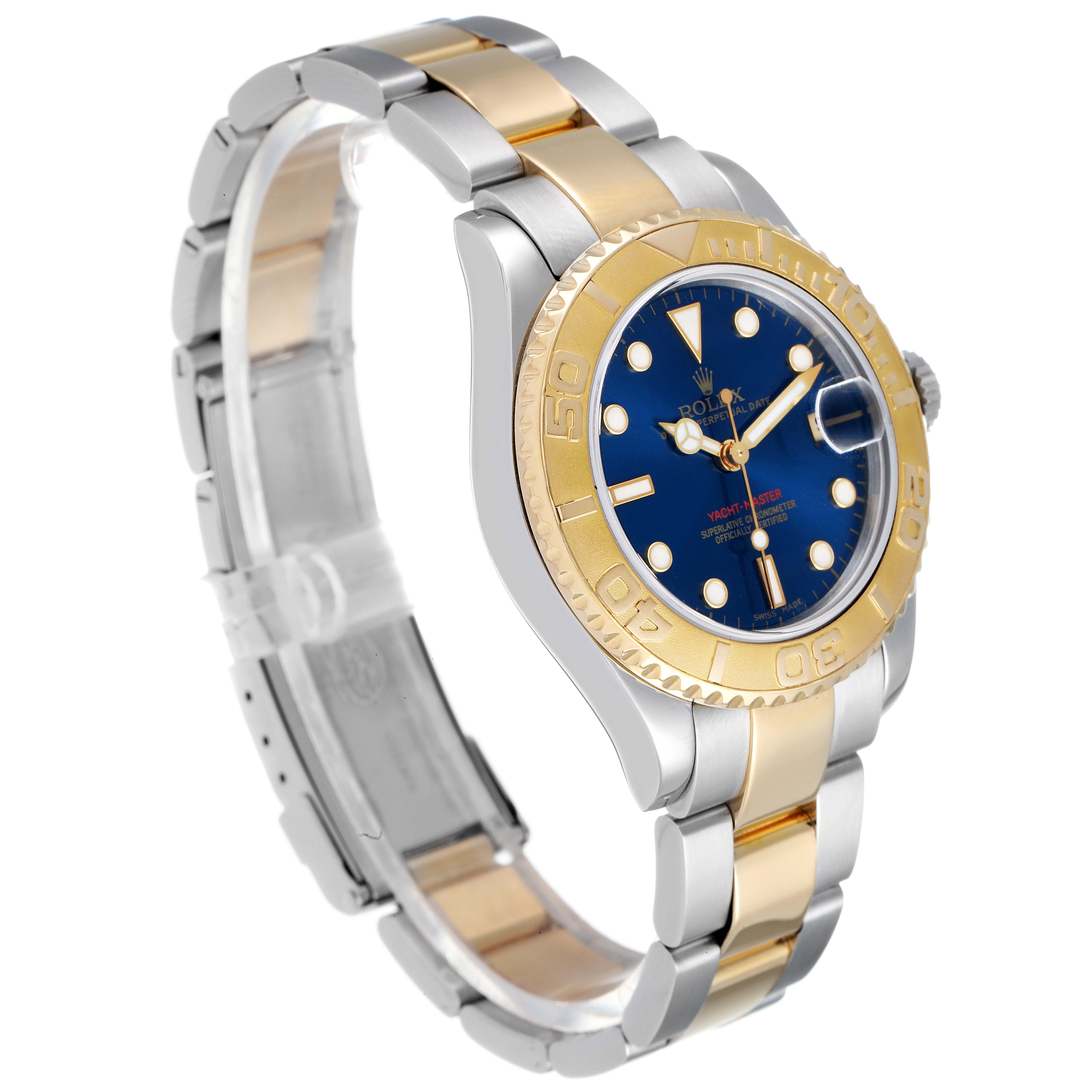 The Rolex Yacht-Master 168623 Men
s Steel and Gold (two tone) Blue Dial 168623 Men
s Steel and Gold (two tone) Blue Dial watch is shown at a slight side angle, highlighting its gold bezel, blue dial, and two-tone bracelet.