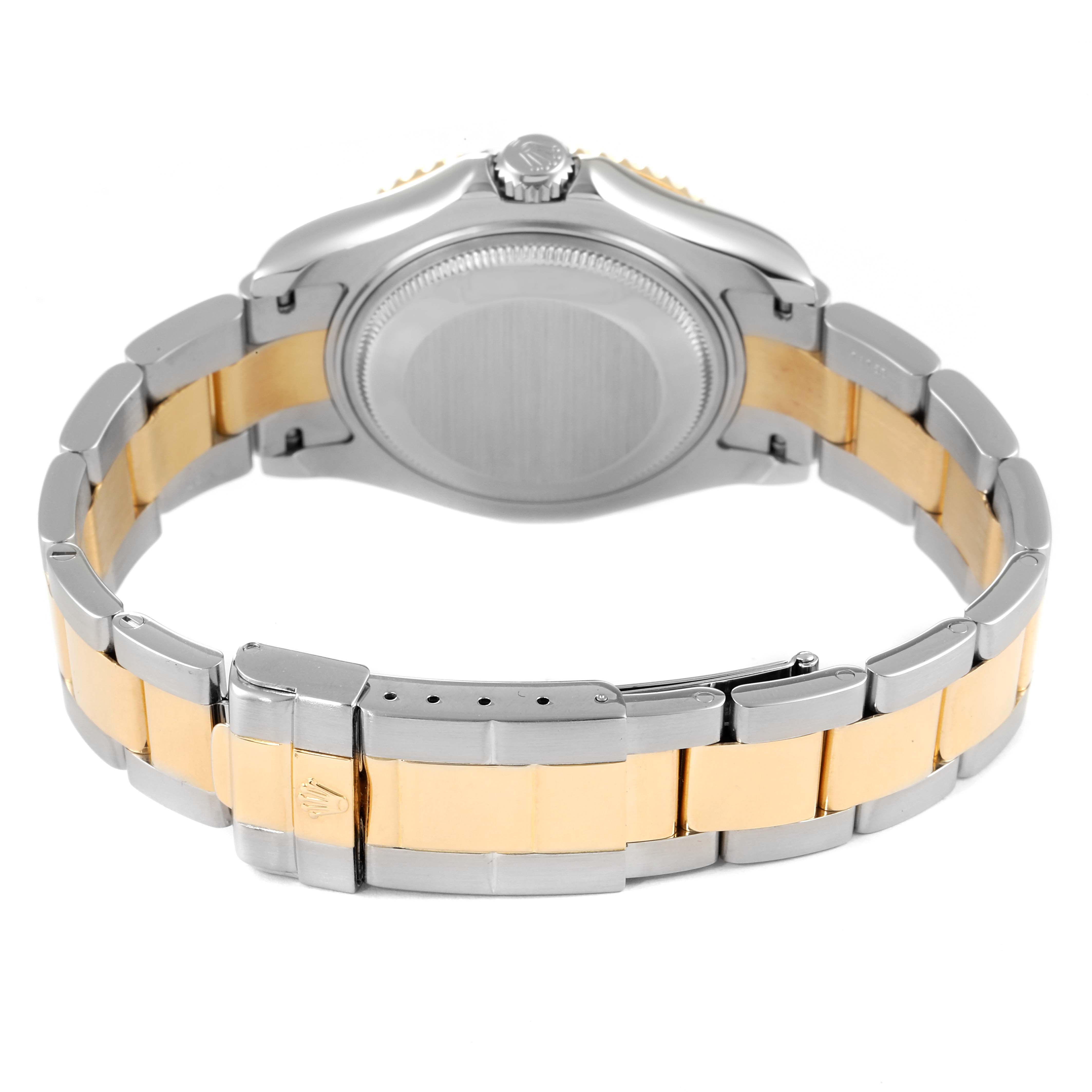 The image shows the back and bracelet of a Rolex Yacht-Master 168623 Men
s Steel and Gold (two tone) Blue Dial 168623 Men
s Steel and Gold (two tone) Blue Dial watch, highlighting the clasp and crown.