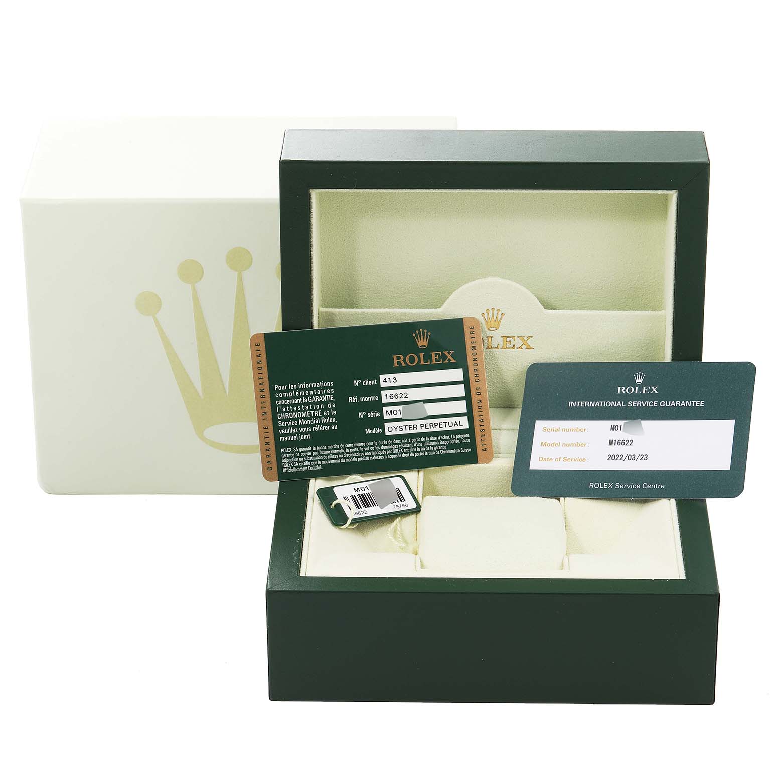 The image shows a Rolex Yacht-Master 16622 Men
s Stainless Steel Silver Dial 16622 Men
s Stainless Steel Silver Dial watch box along with warranty cards and tags.