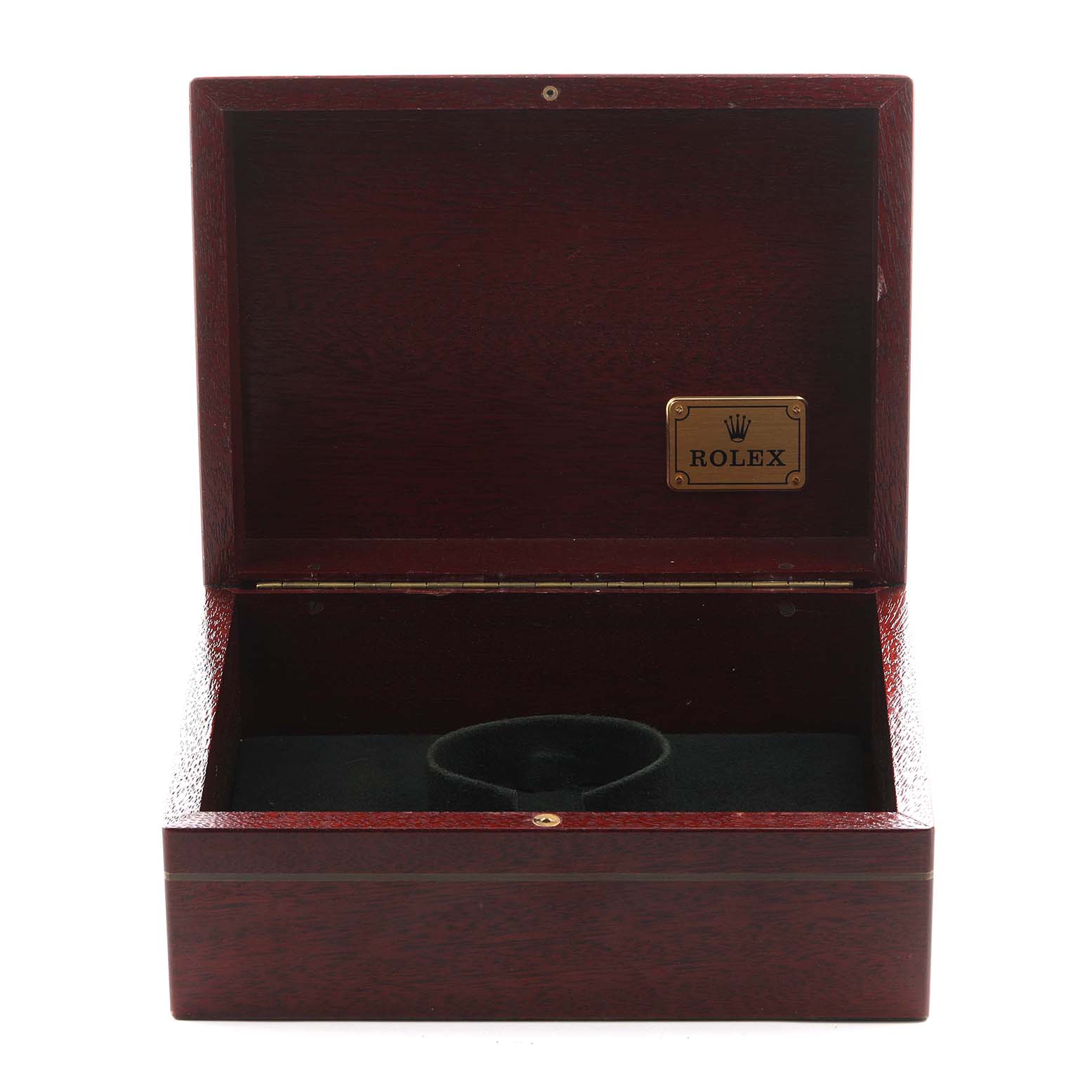 The image shows an open Rolex Yacht-Master 16628 Men
s Yellow Gold Mother of Pearl Dial 16628 Men
s Yellow Gold Mother of Pearl Dial watch box at eye level, revealing its interior cushion and logo plaque.