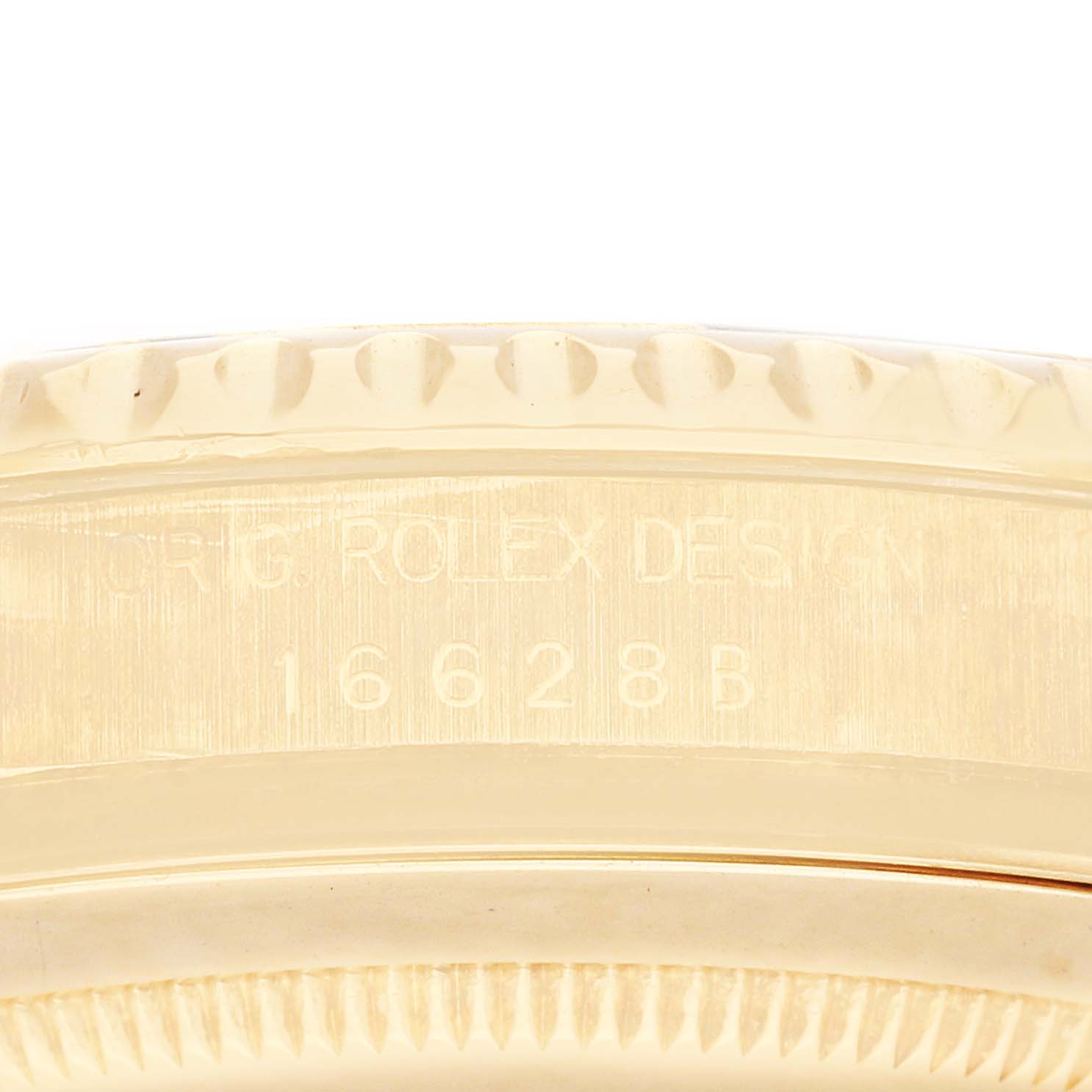 The image shows a side view of the Rolex Yacht-Master 16628 Men
s Yellow Gold Mother of Pearl Dial 16628 Men
s Yellow Gold Mother of Pearl Dial
s case edge, highlighting the bezel and model engraving.