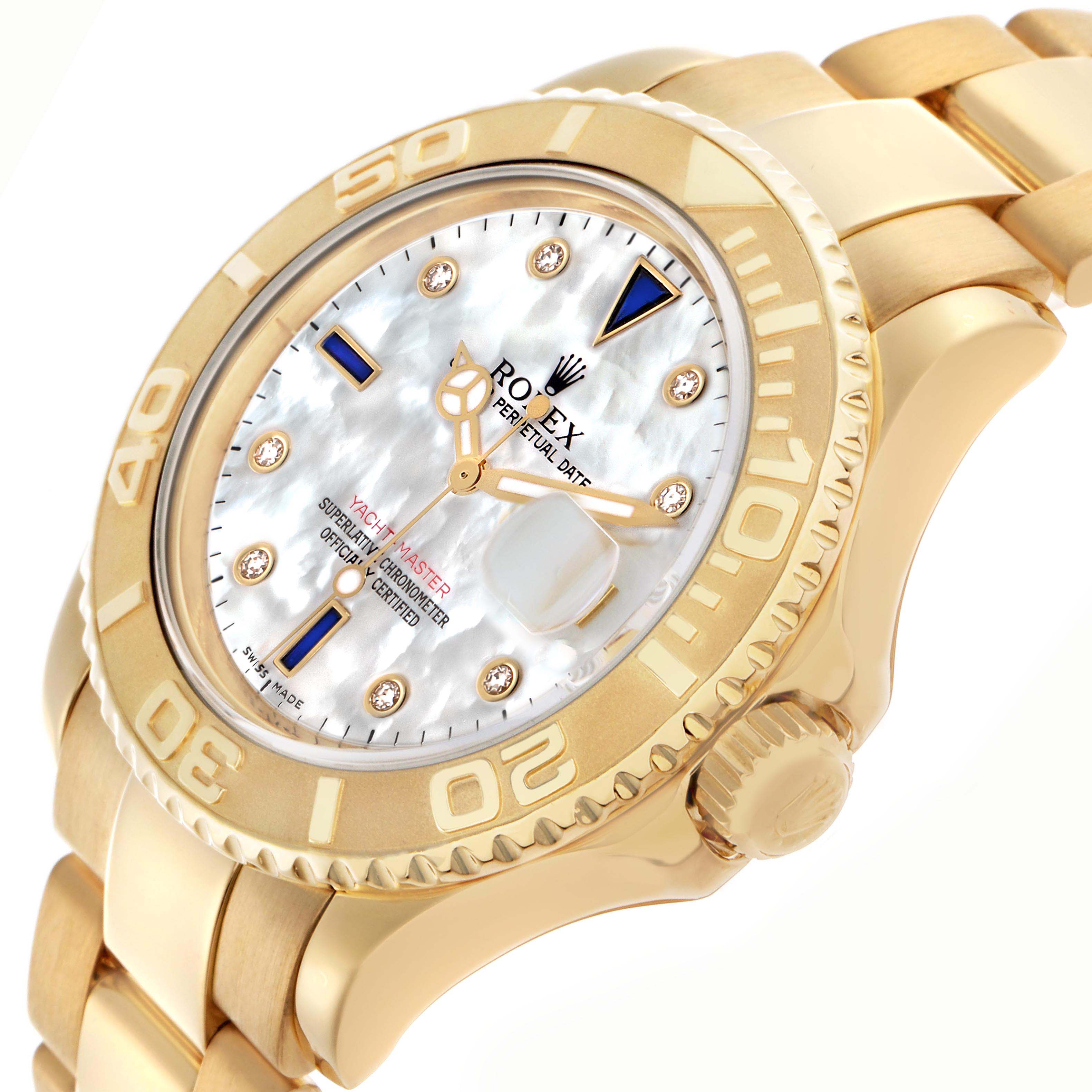The Rolex Yacht-Master 16628 Men
s Yellow Gold Mother of Pearl Dial 16628 Men
s Yellow Gold Mother of Pearl Dial watch is shown at an angled view, highlighting the dial, bezel, crown, and part of the bracelet.