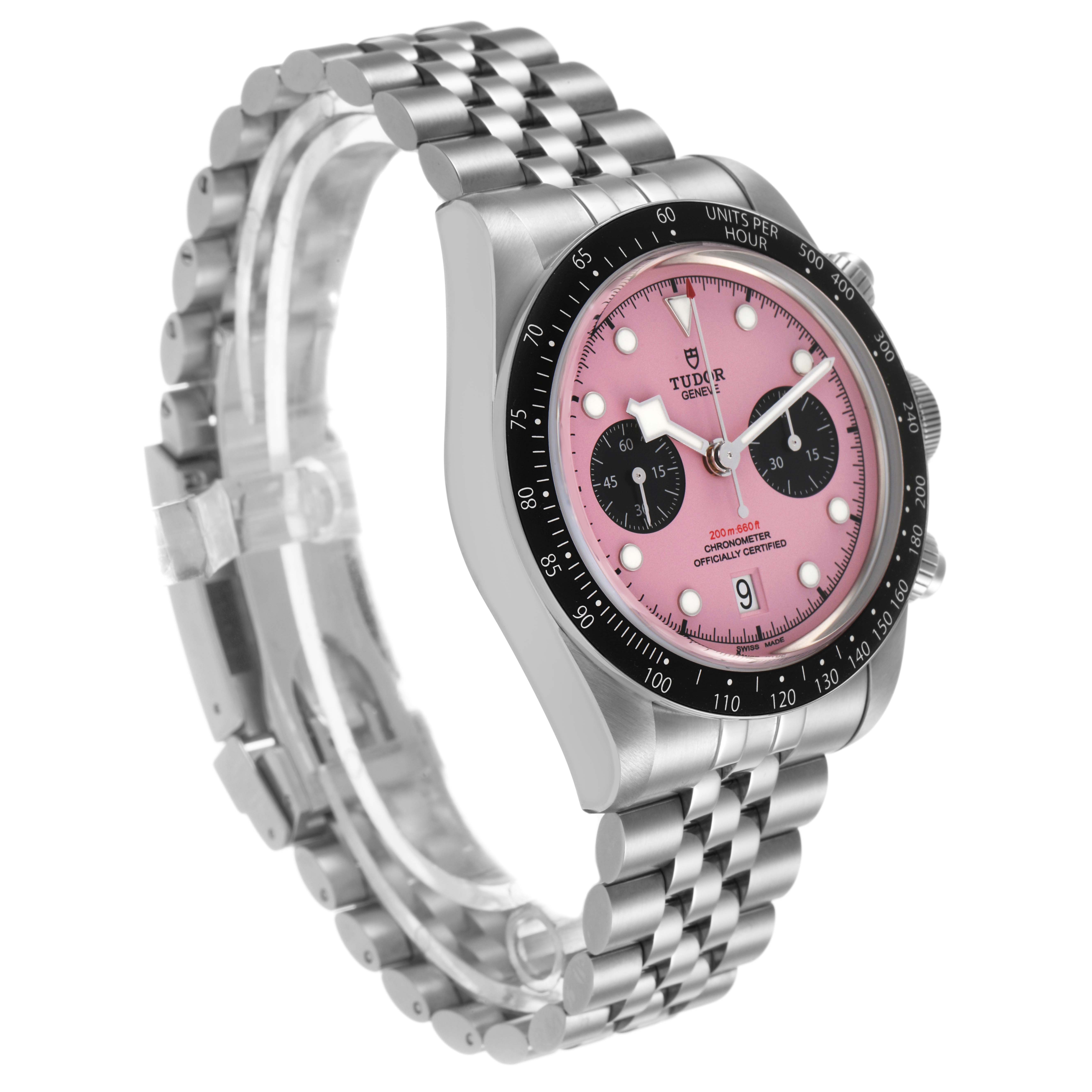 The Tudor Heritage Chrono M79360N-0019 Men's Stainless Steel Pink Dial watch is shown at an angle highlighting the face, bezel, and bracelet.