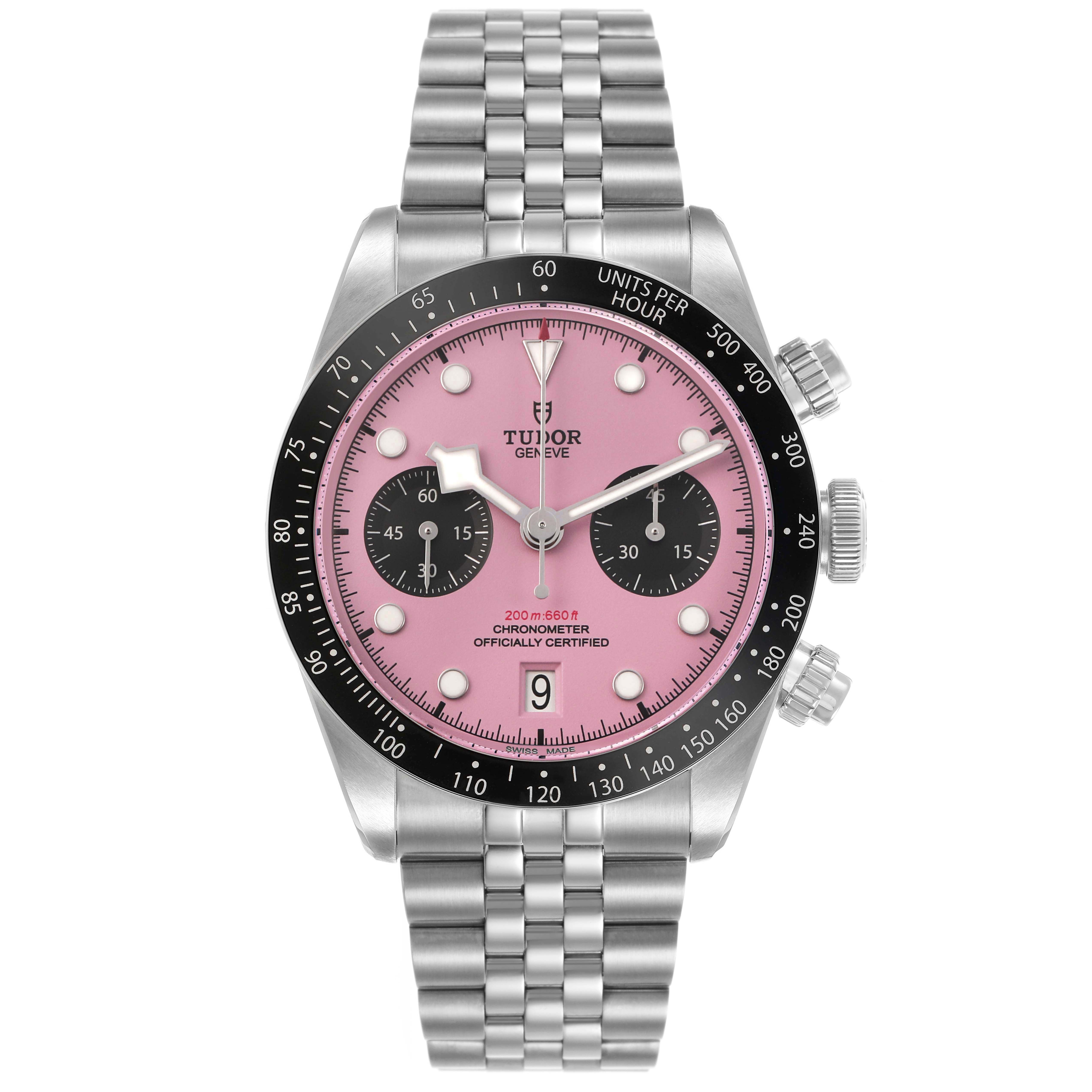 The Tudor Heritage Chrono M79360N-0019 Men's Stainless Steel Pink Dial watch is shown from a front angle, highlighting its pink dial, black subdials, bezel, and metal bracelet.