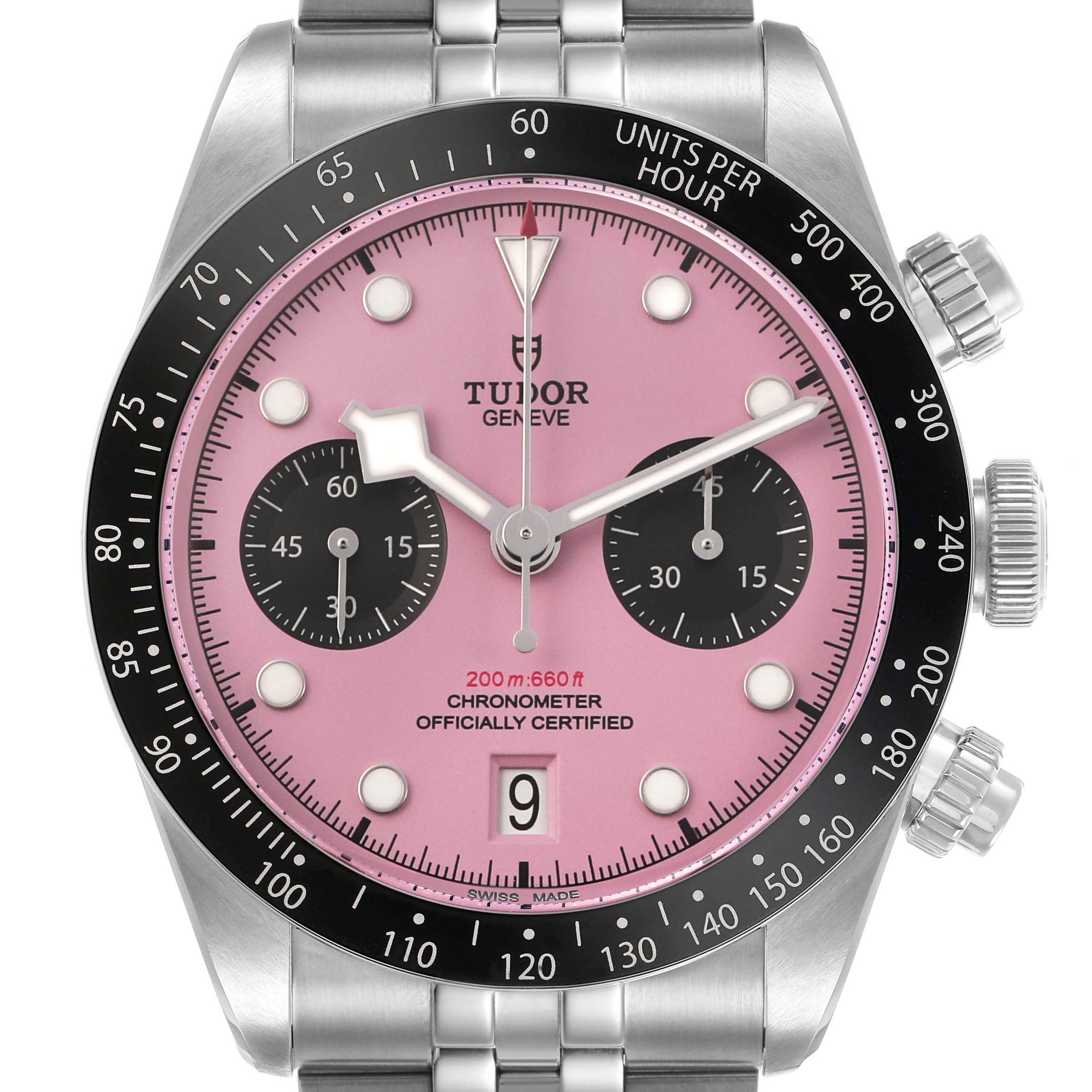 The Tudor Heritage Chrono M79360N-0019 Men's Stainless Steel Pink Dial watch is shown from a front angle, displaying its dial, bezel, and bracelet.