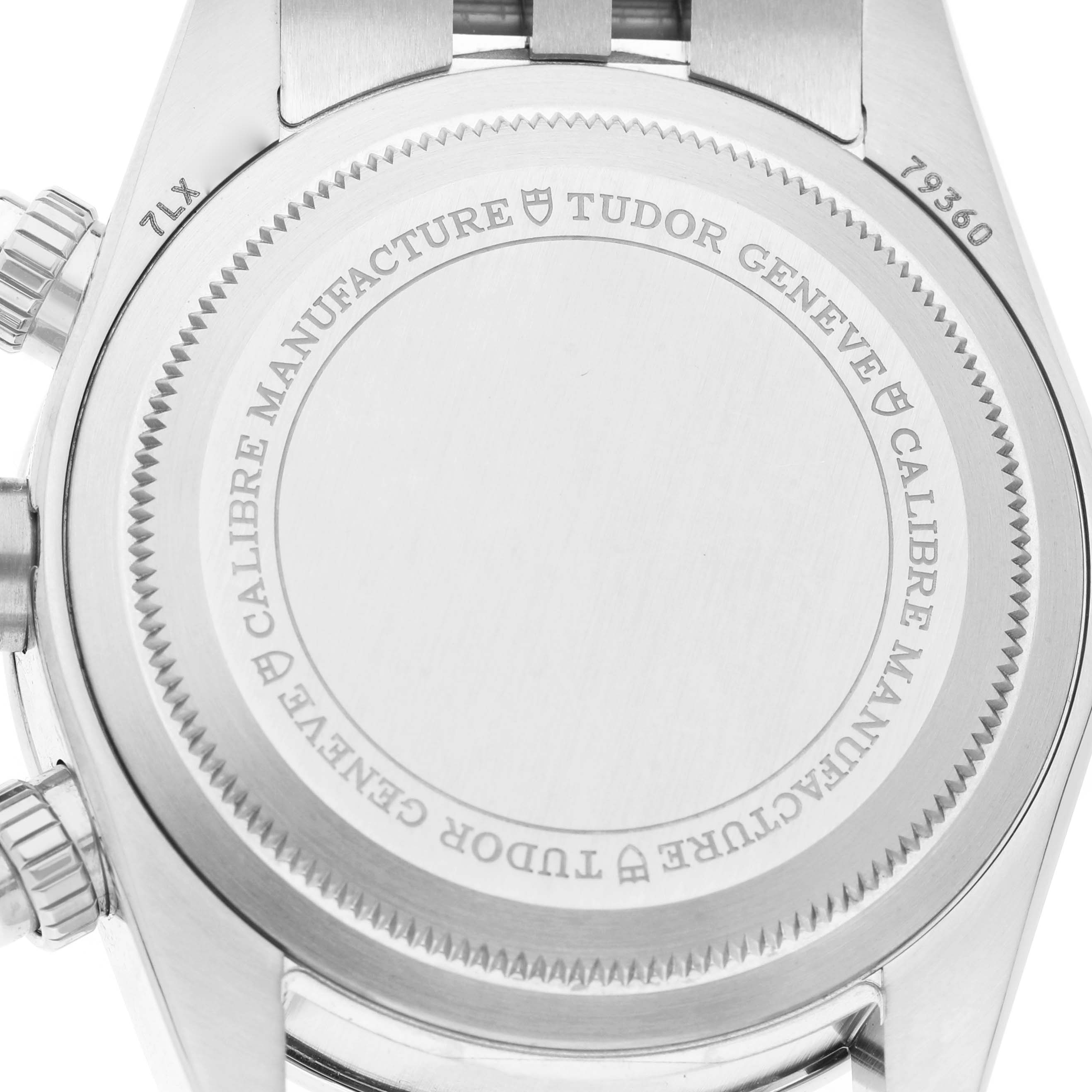 The image shows the back casing of a Tudor Heritage Chrono M79360N-0019 Men's Stainless Steel Pink Dial watch featuring the engraved brand and model details.