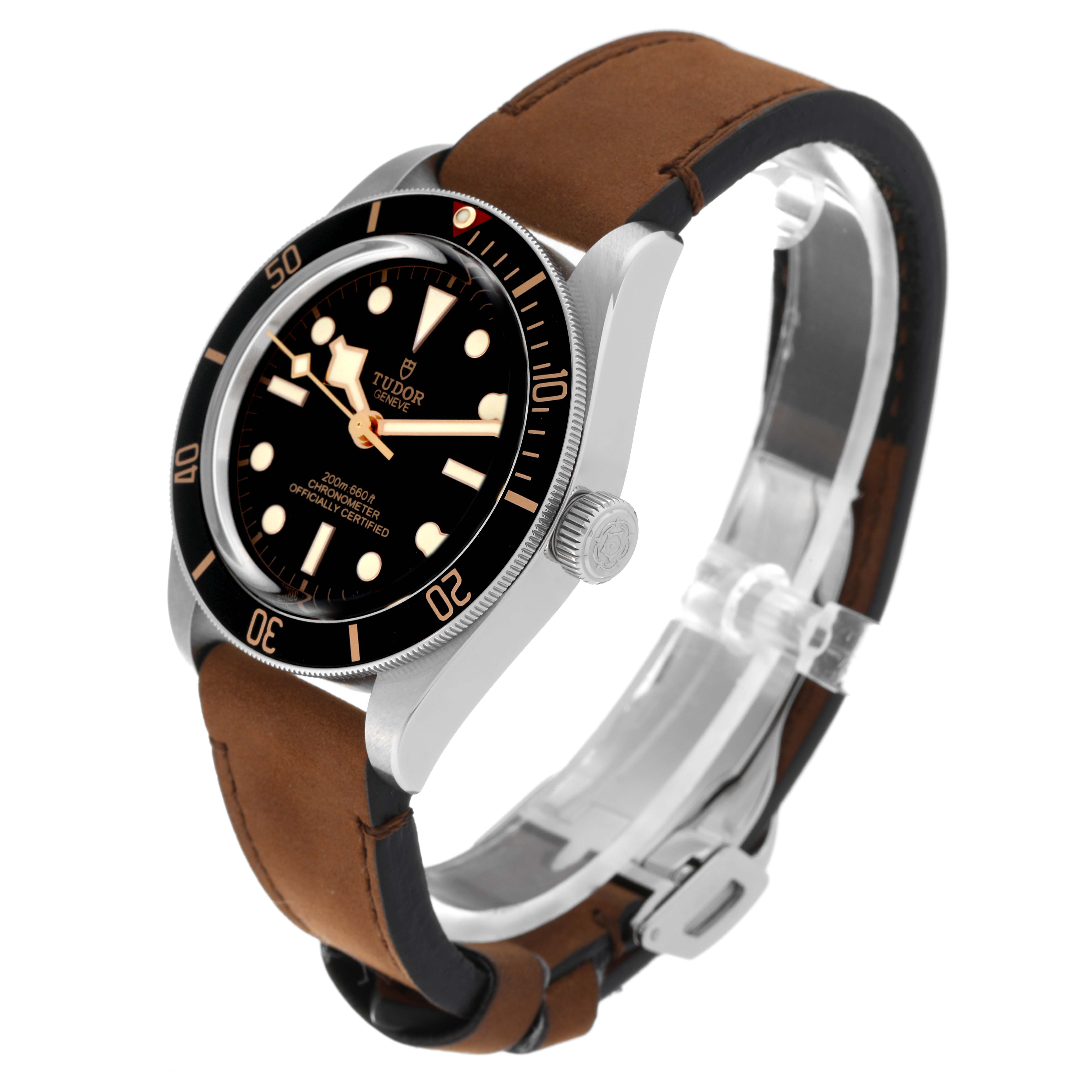 The image shows a Tudor Heritage Black Bay M79030N-0002 Men
s Stainless Steel Black Dial M79030N-0002 Men
s Stainless Steel Black Dial watch at a slight side angle, highlighting the black dial, bezel, and brown leather strap.