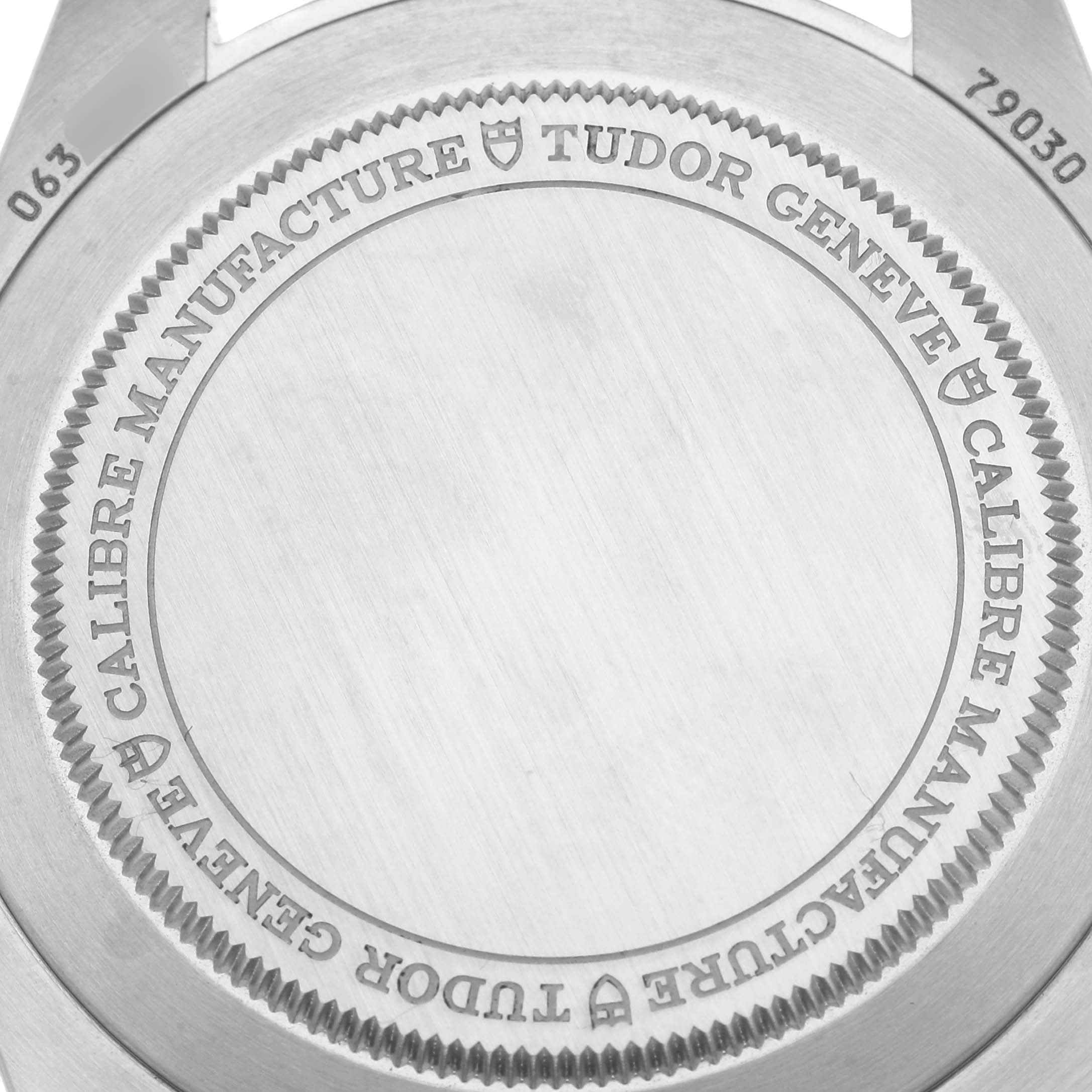 This image shows the case back of a Tudor Heritage Black Bay M79030N-0002 Men
s Stainless Steel Black Dial M79030N-0002 Men
s Stainless Steel Black Dial watch, highlighting its engraved details and the model number.