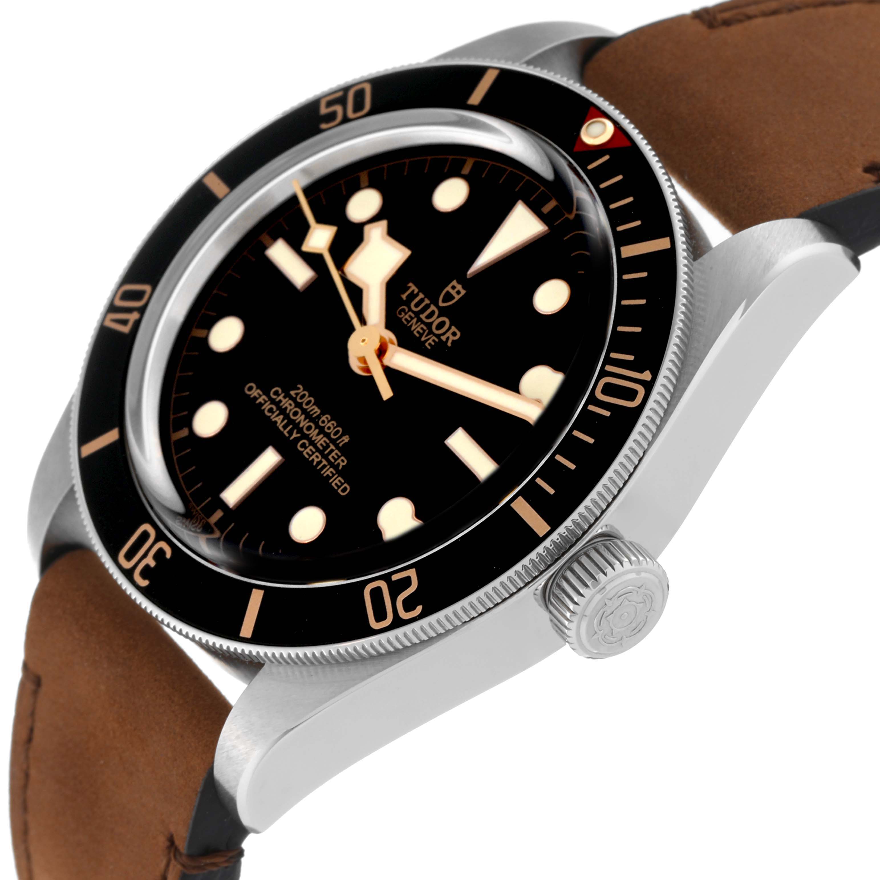 The image shows a Tudor Heritage Black Bay M79030N-0002 Men
s Stainless Steel Black Dial M79030N-0002 Men
s Stainless Steel Black Dial watch at an angled side view, highlighting the dial, bezel, crown, and part of the strap.