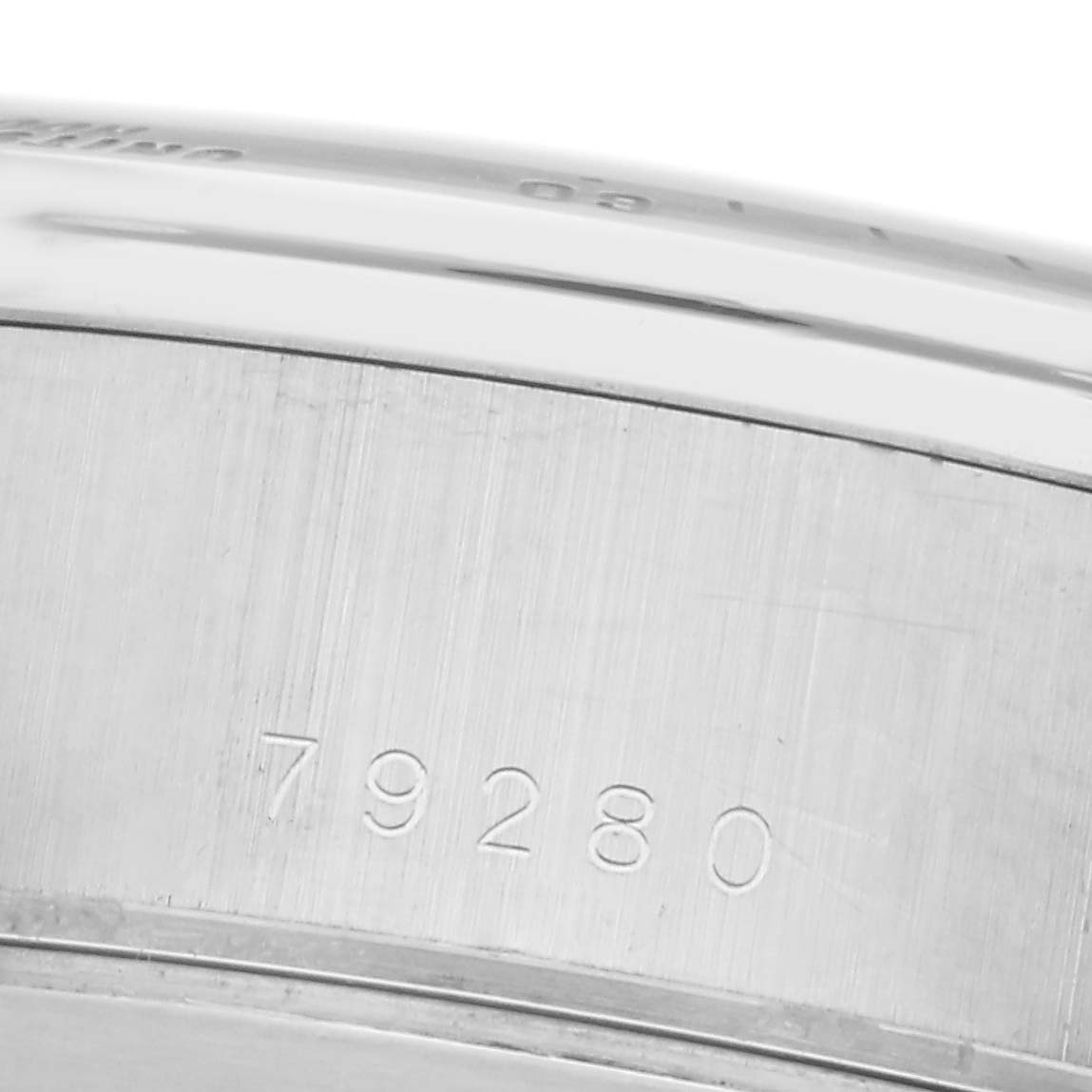 The image shows the side of a Tudor Tiger 79280 Men
s Stainless Steel Black Dial 79280 Men
s Stainless Steel Black Dial watch case with the model number 79280 engraved.