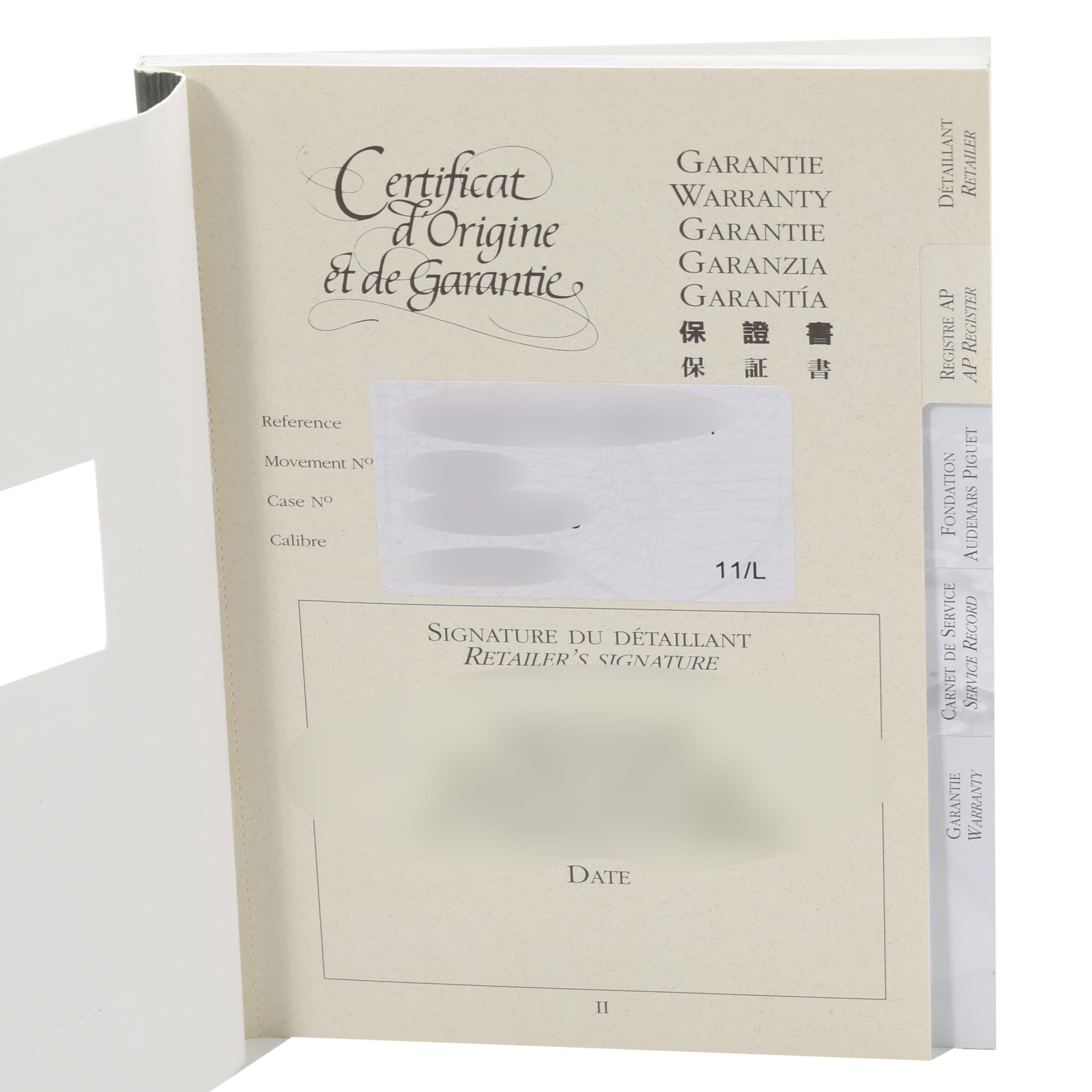 The image shows an angled view of the warranty booklet for the Audemars Piguet Royal Oak 26120ST.00.1220ST.01 Men's Stainless Steel Silver Dial 26120ST.00.1220ST.01 Men's Stainless Steel Silver Dial model.